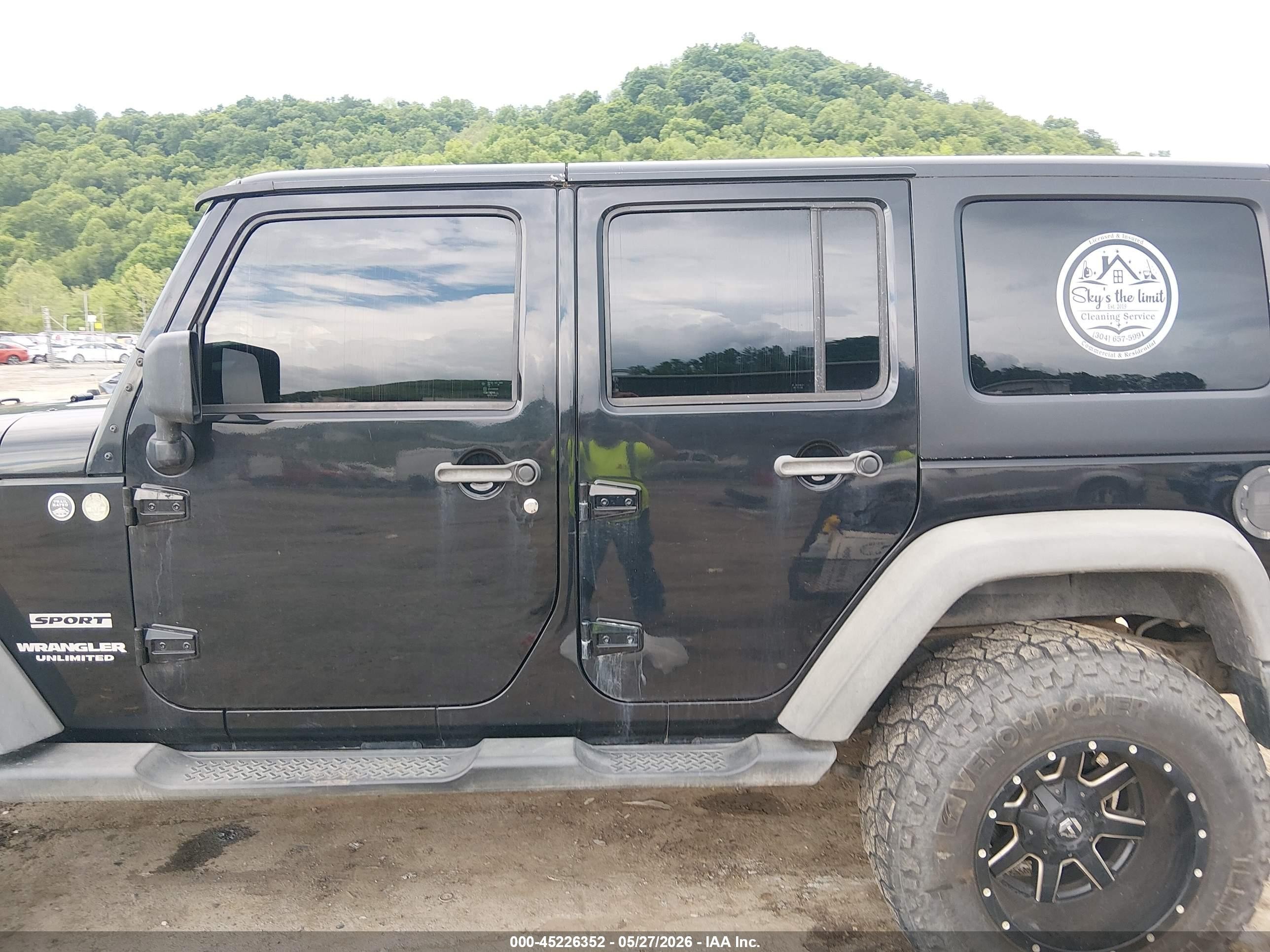 2012 Jeep Wrangler Unlimited Sport Black vin: 1C4BJWDG5CL141472
