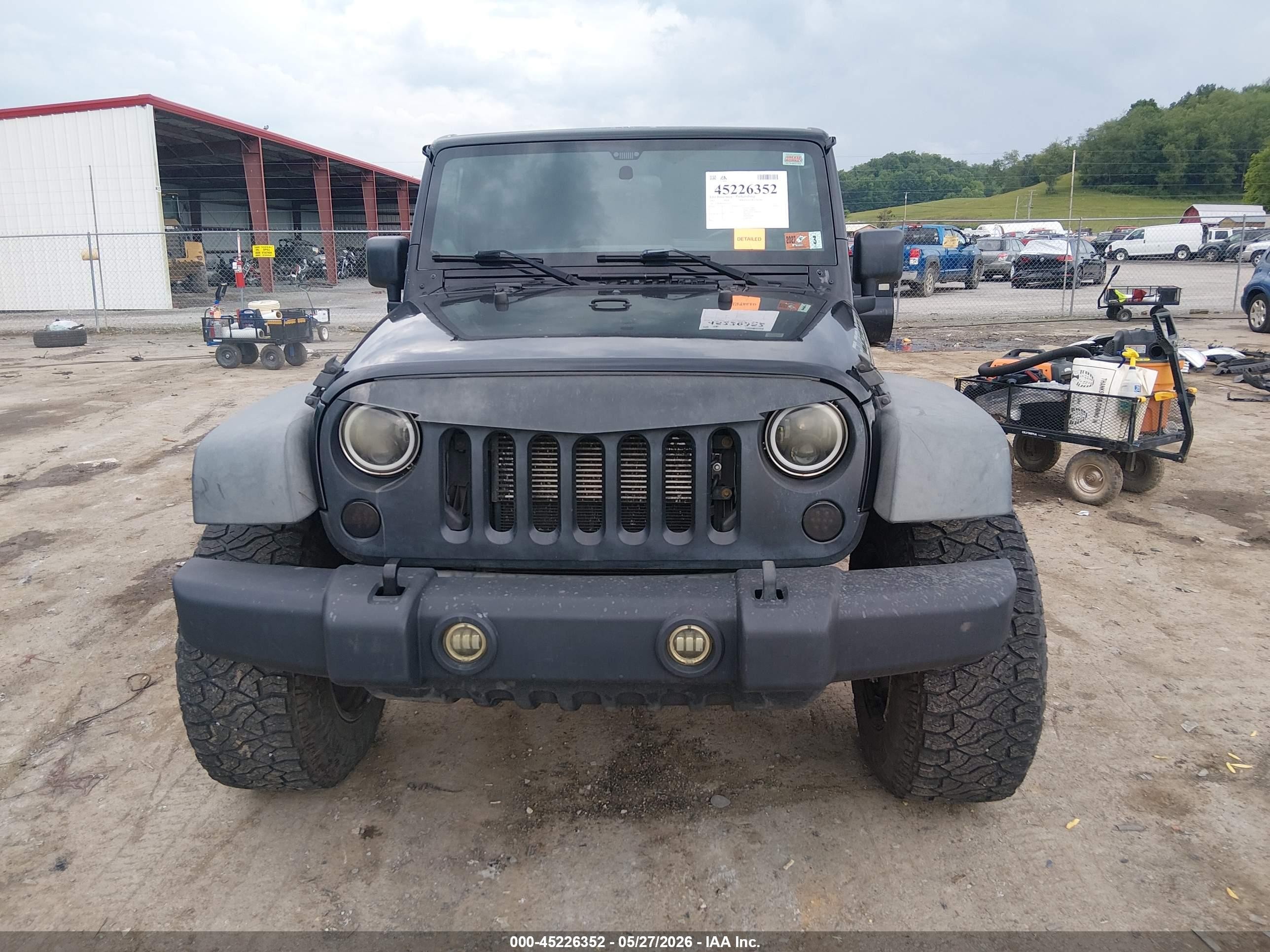 2012 Jeep Wrangler Unlimited Sport Black vin: 1C4BJWDG5CL141472