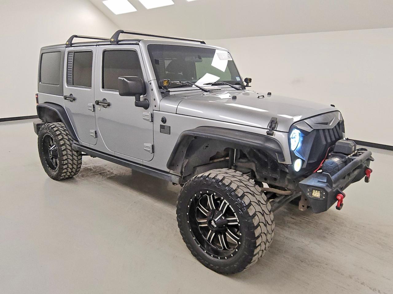 2015 Jeep Wrangler Unlimited Sport Silver vin: 1C4BJWDG5FL505104