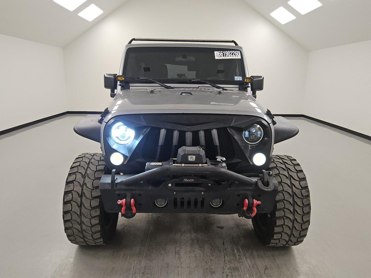 2015 Jeep Wrangler Unlimited Sport Silver vin: 1C4BJWDG5FL505104 Damage: Grille, Aftermarket, Acceptable