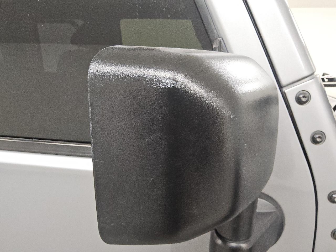 2015 Jeep Wrangler Unlimited Sport Silver vin: 1C4BJWDG5FL505104 Damage: Rf Mirror Cover, Heavy Scratch, 1/2 To 1 Inch