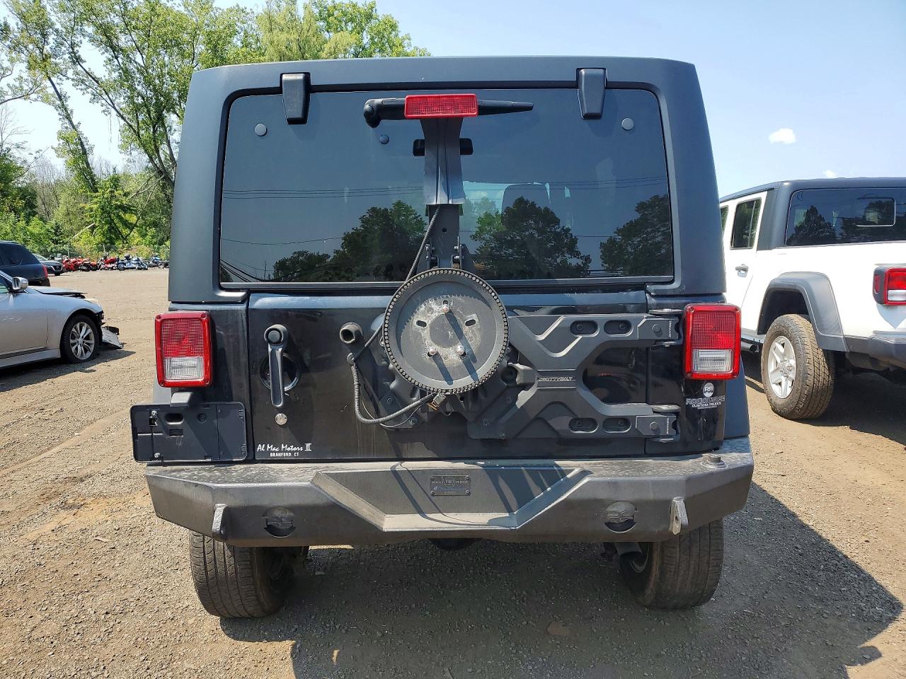 2015 Jeep Wrangler Unlimited Sport Black vin: 1C4BJWDG5FL663247