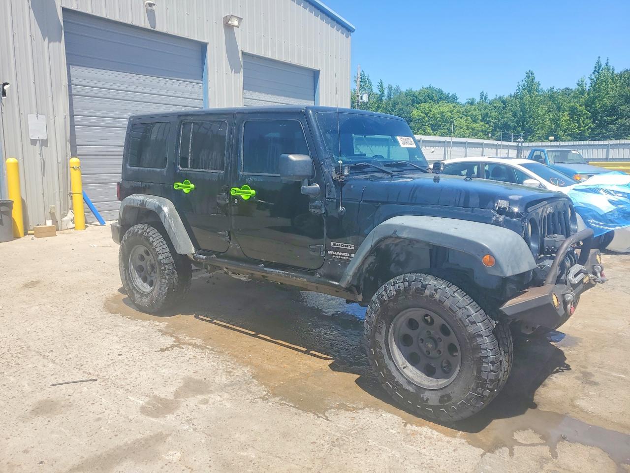 2012 Jeep Wrangler Unlimited Sport Black vin: 1C4BJWDG6CL119190