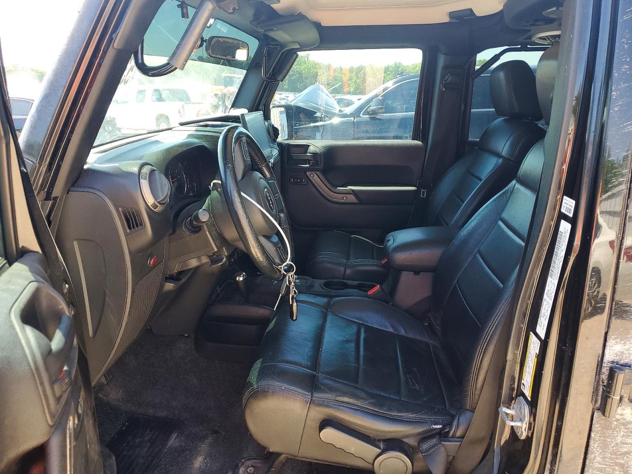 2012 Jeep Wrangler Unlimited Sport Black vin: 1C4BJWDG6CL119190