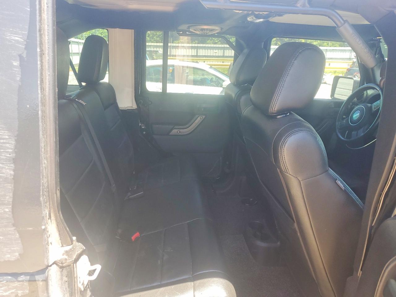 2012 Jeep Wrangler Unlimited Sport Black vin: 1C4BJWDG6CL119190