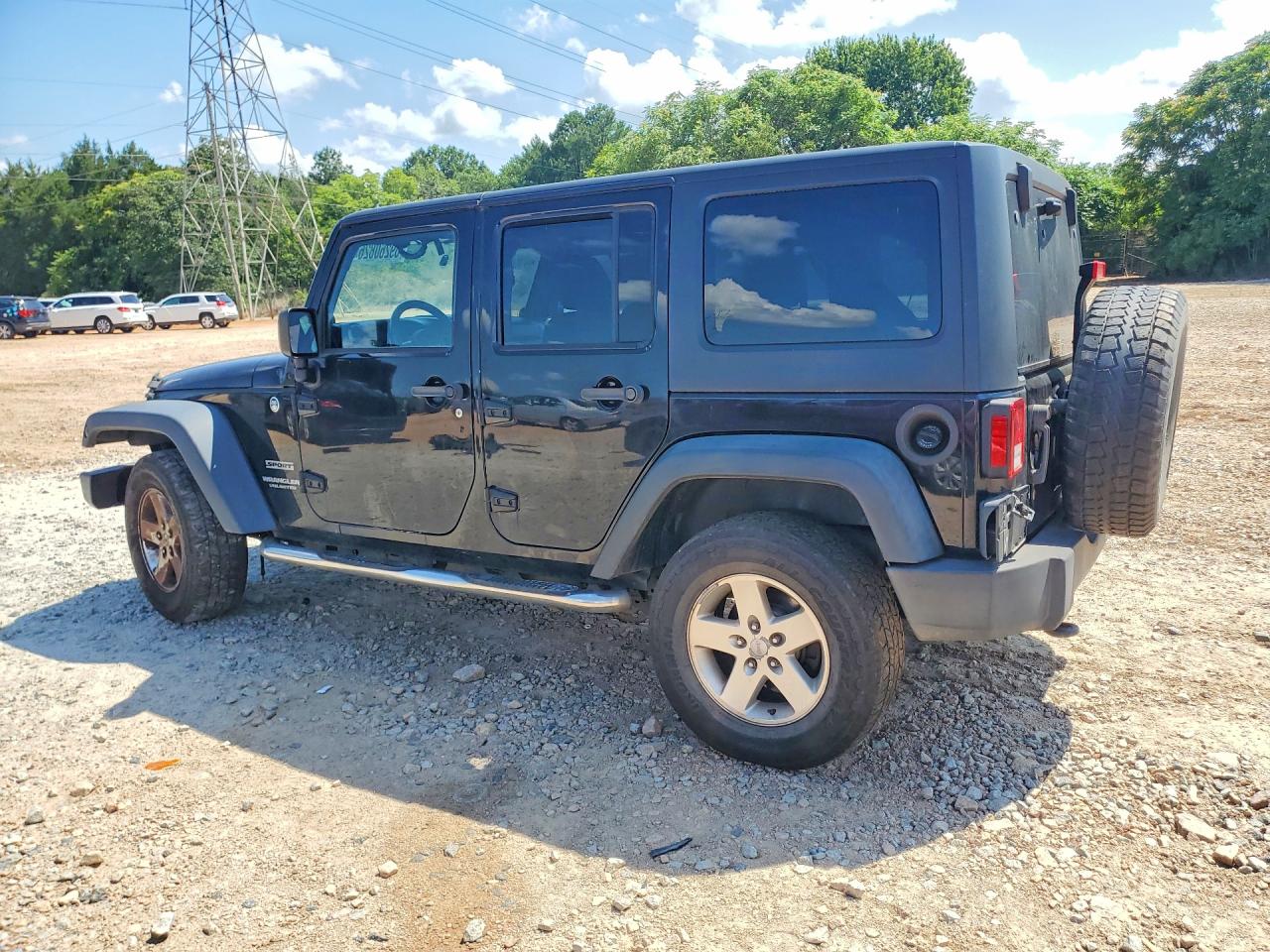 2012 Jeep Wrangler Unlimited Sport Black vin: 1C4BJWDG6CL249230