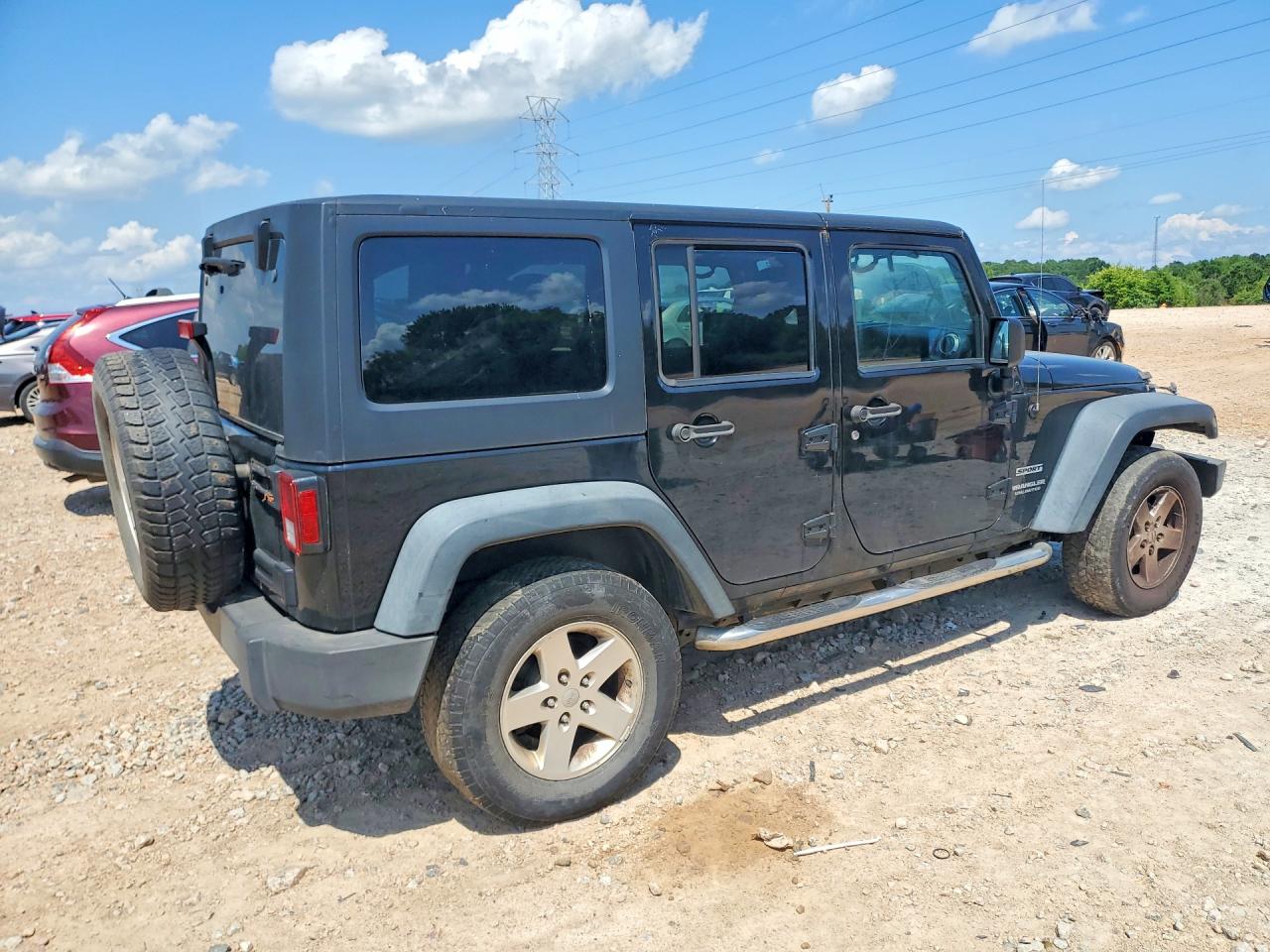 2012 Jeep Wrangler Unlimited Sport Black vin: 1C4BJWDG6CL249230