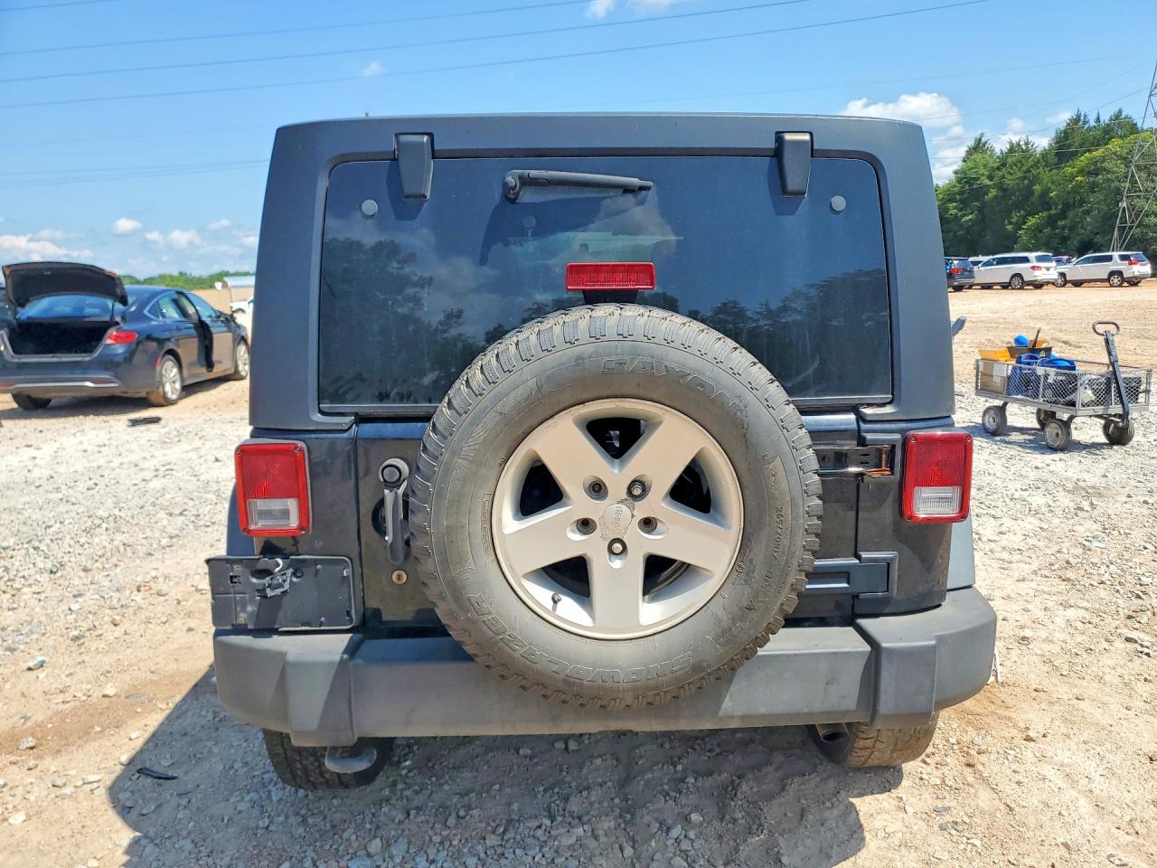2012 Jeep Wrangler Unlimited Sport Black vin: 1C4BJWDG6CL249230