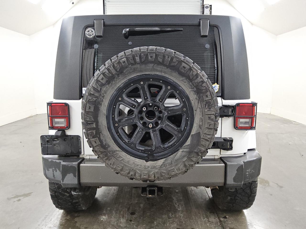 2013 Jeep Wrangler Unlimited Sport White vin: 1C4BJWDG6DL613986 Damage: Spare Tire, Aftermarket, Non-Oem