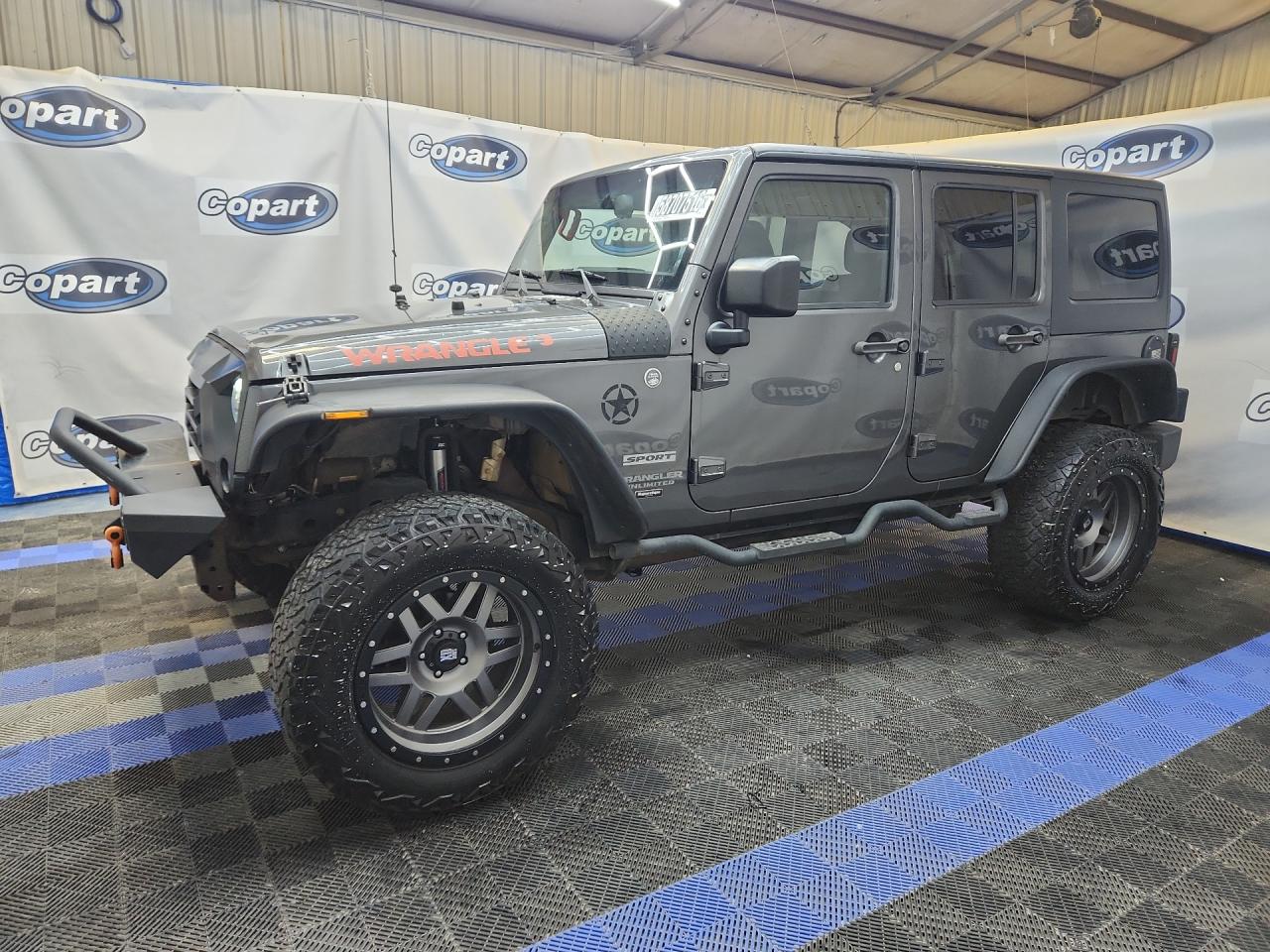 2014 Jeep Wrangler Unlimited Sport Gray vin: 1C4BJWDG6EL270288 Damage: Left Front Wheel, Aftermarket, Acceptable