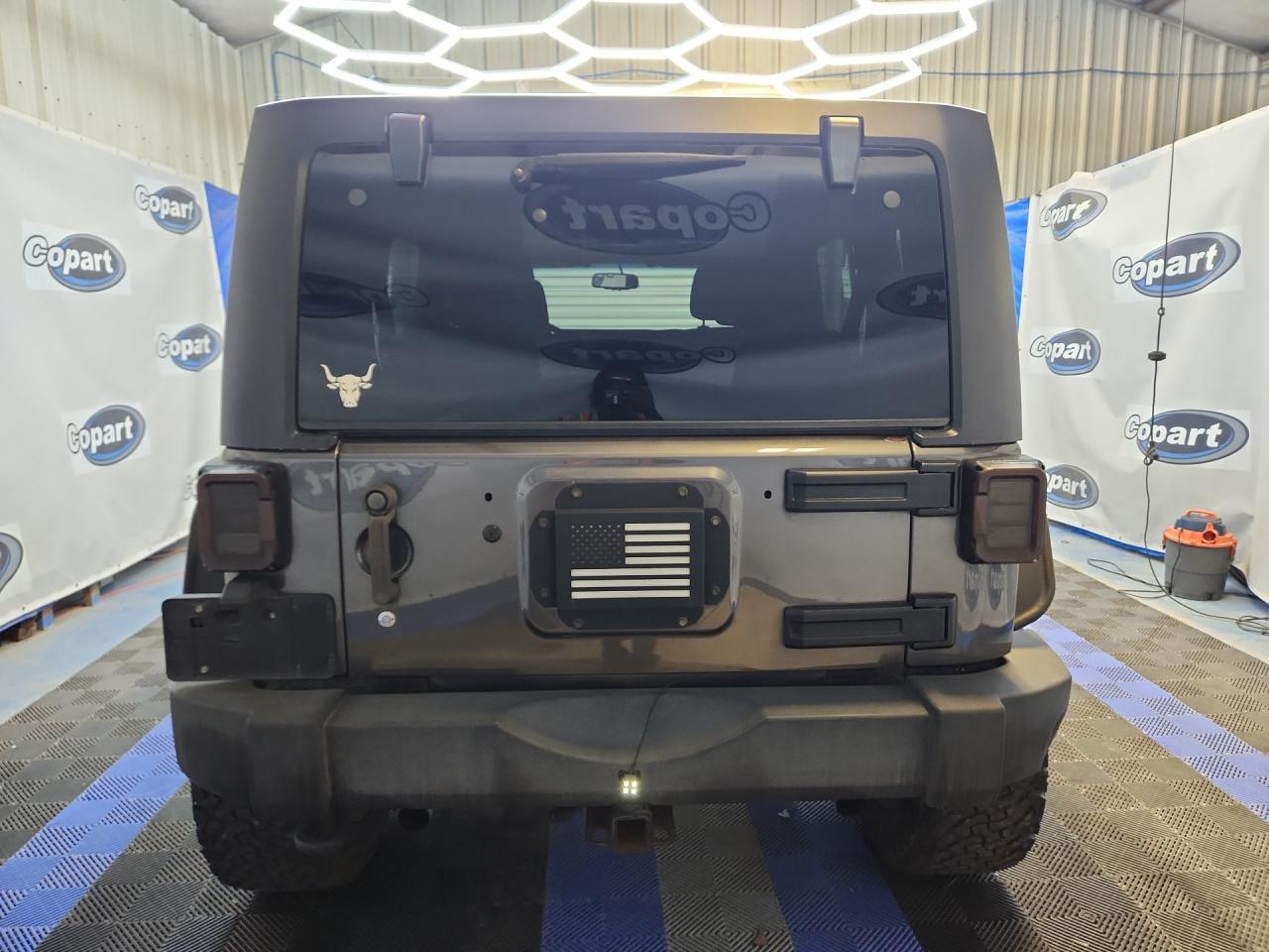 2014 Jeep Wrangler Unlimited Sport Gray vin: 1C4BJWDG6EL270288 Damage: Right Tail Light, Aftermarket, Acceptable