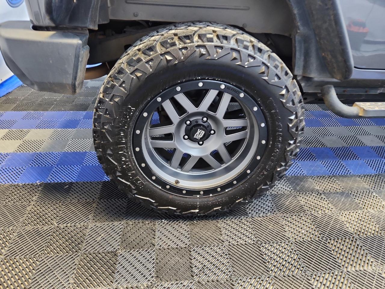 2014 Jeep Wrangler Unlimited Sport Gray vin: 1C4BJWDG6EL270288 Damage: Right Rear Wheel, Aftermarket, Acceptable
