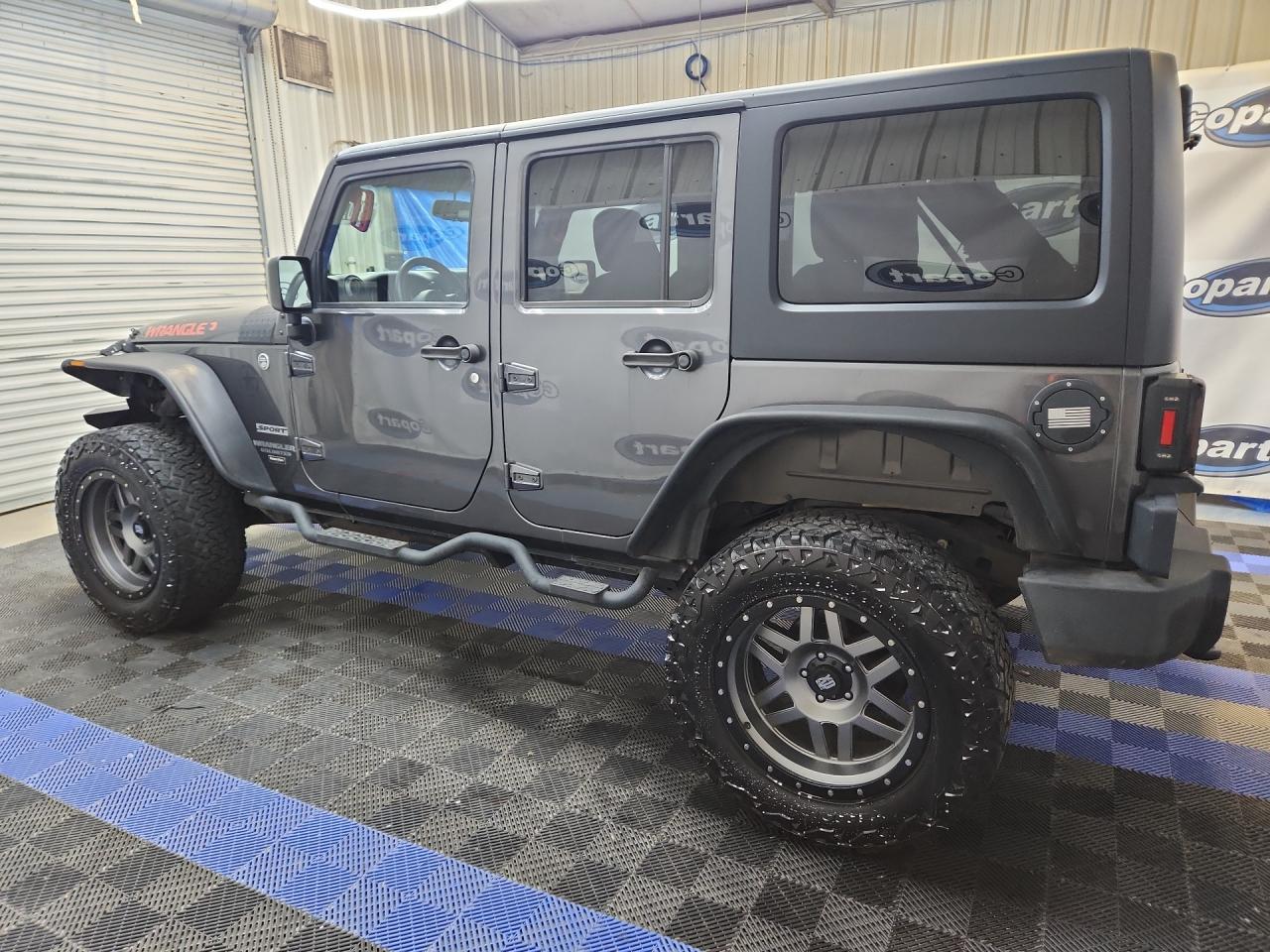 2014 Jeep Wrangler Unlimited Sport Gray vin: 1C4BJWDG6EL270288 Damage: Left Fuel Door, Aftermarket, Acceptable