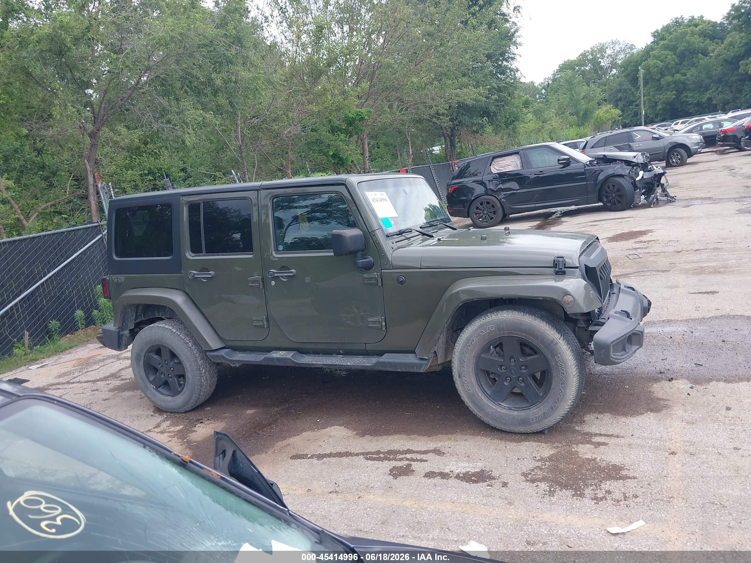 2015 Jeep Wrangler Unlimited Sport Green vin: 1C4BJWDG6FL762627