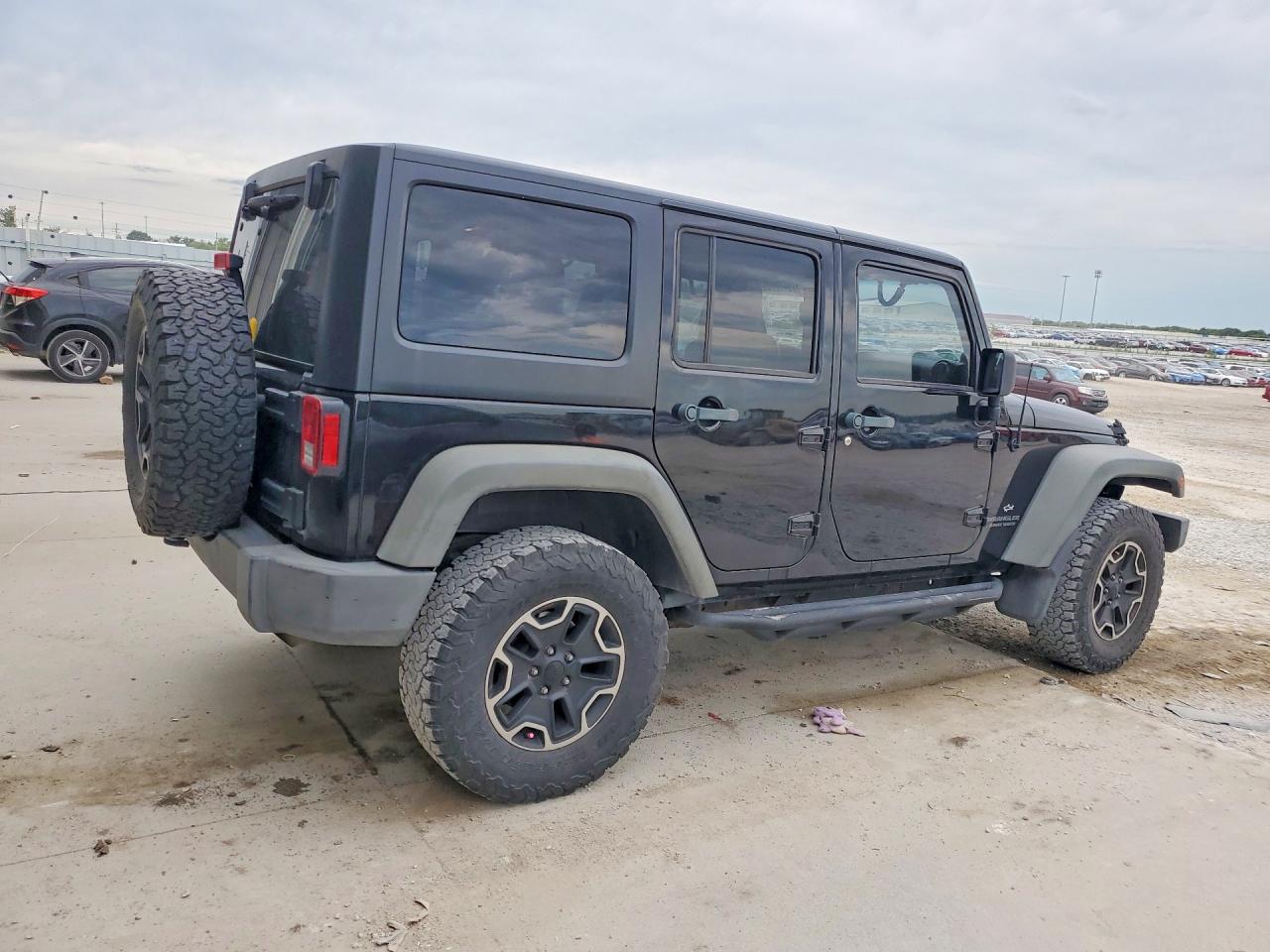 2012 Jeep Wrangler Unlimited Sport Черный vin: 1C4BJWDG7CL100616