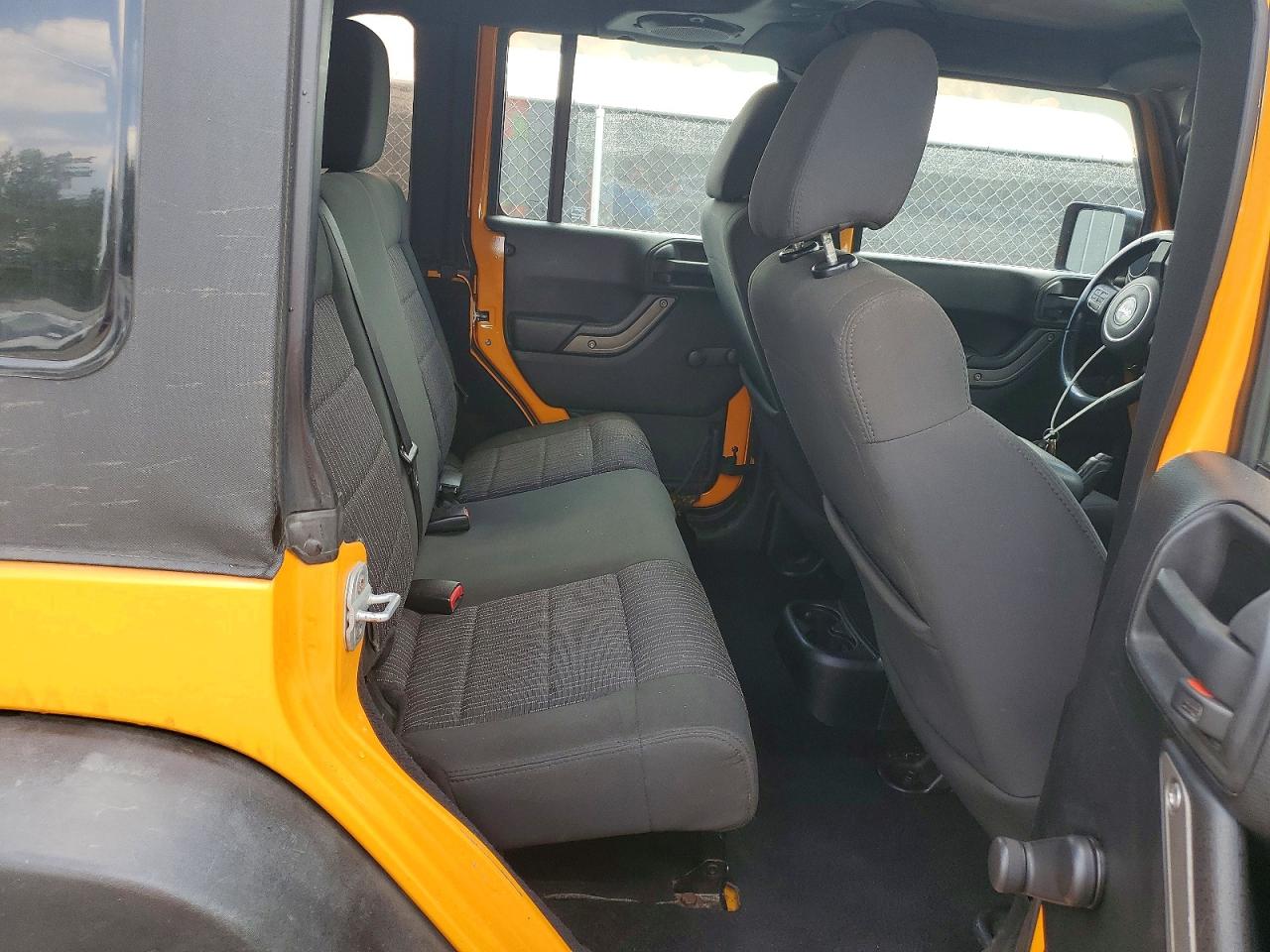 2012 Jeep Wrangler Unlimited Sport Yellow vin: 1C4BJWDG7CL120428