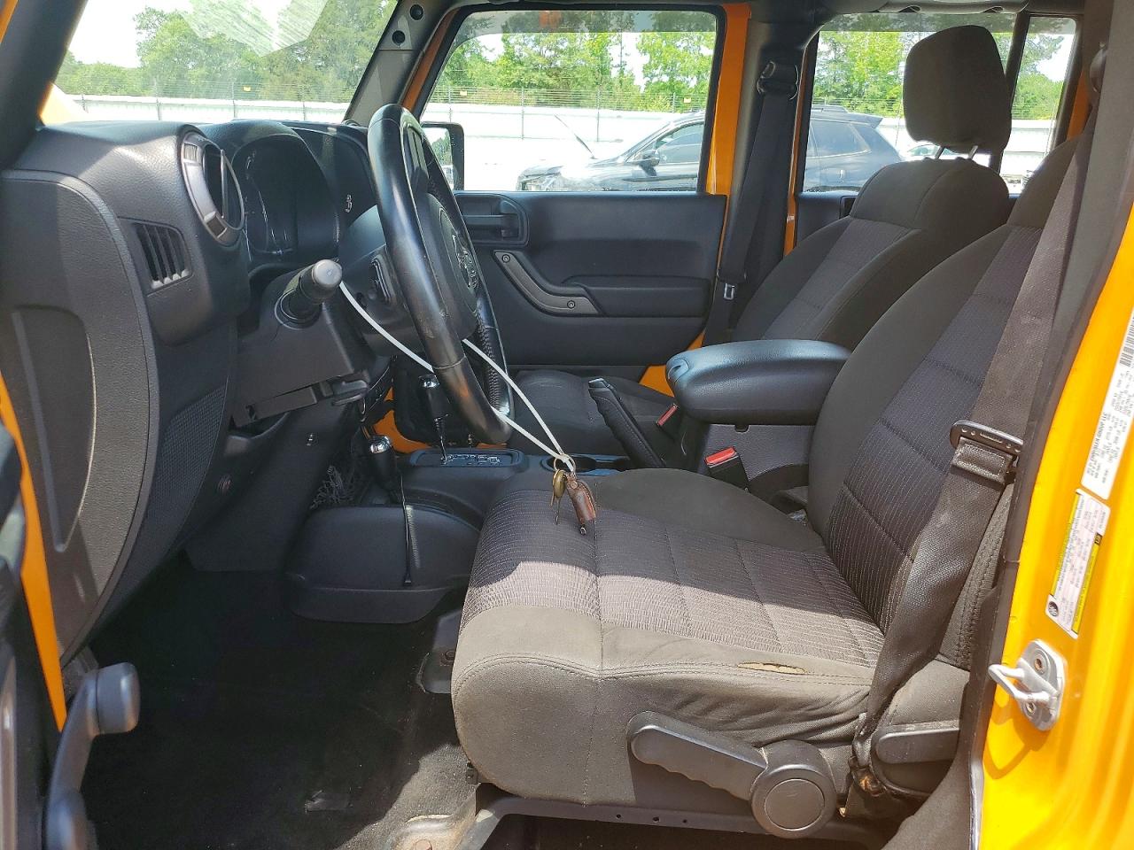 2012 Jeep Wrangler Unlimited Sport Yellow vin: 1C4BJWDG7CL120428