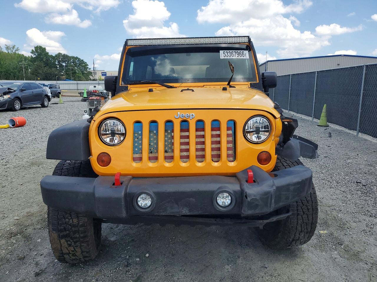 2012 Jeep Wrangler Unlimited Sport Yellow vin: 1C4BJWDG7CL120428