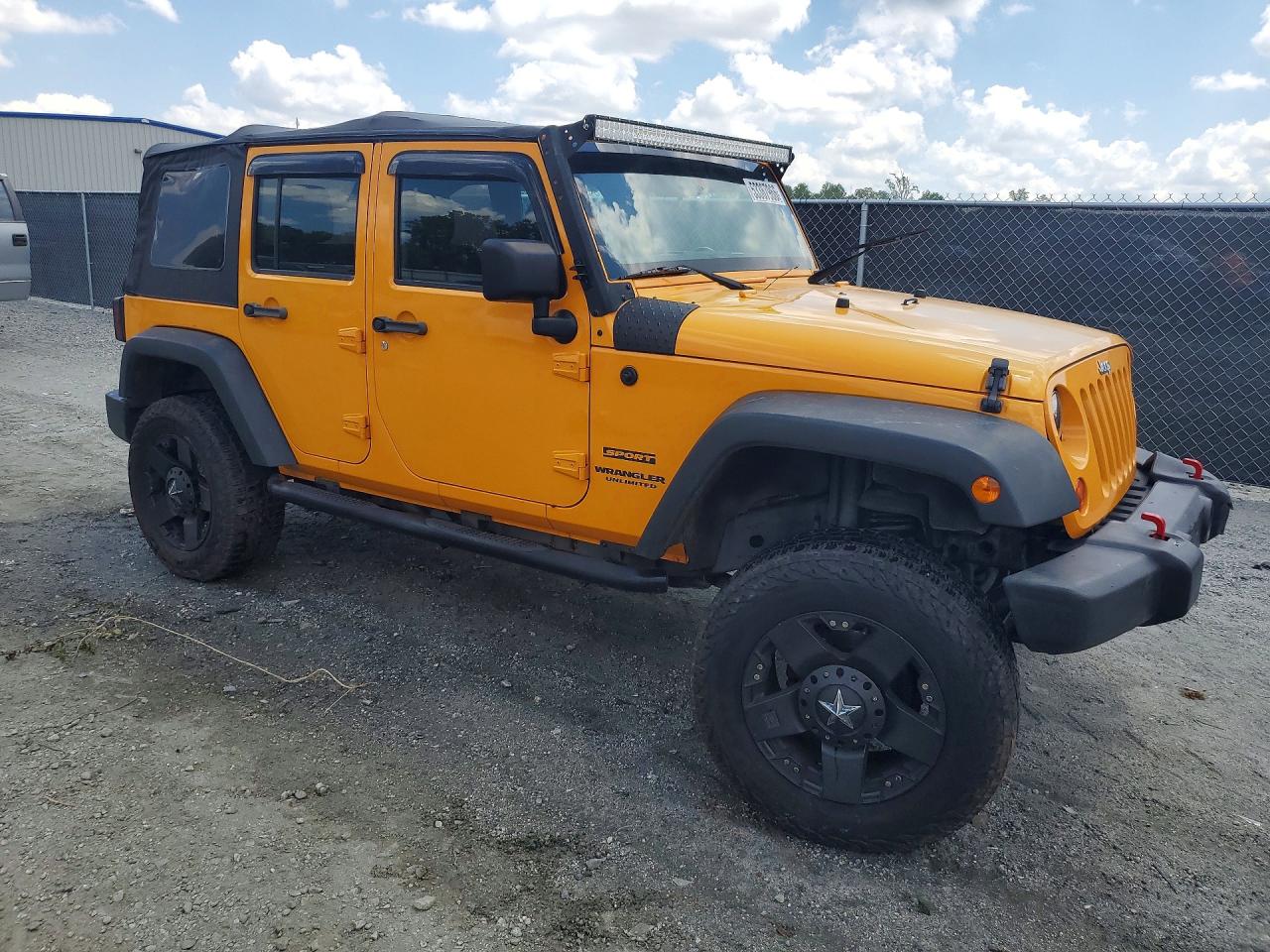 2012 Jeep Wrangler Unlimited Sport Yellow vin: 1C4BJWDG7CL120428