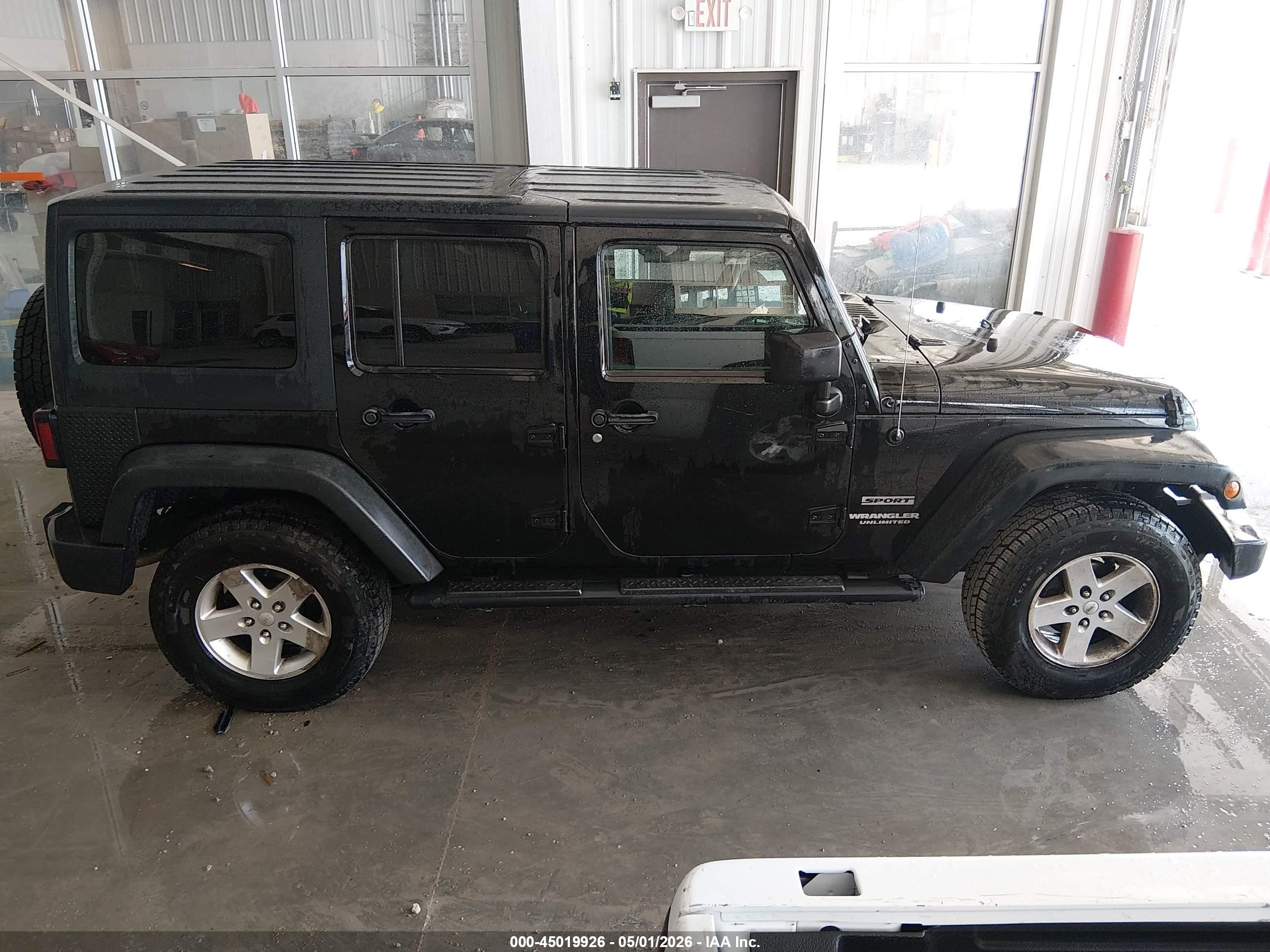 2012 Jeep Wrangler Unlimited Sport Black vin: 1C4BJWDG7CL266845