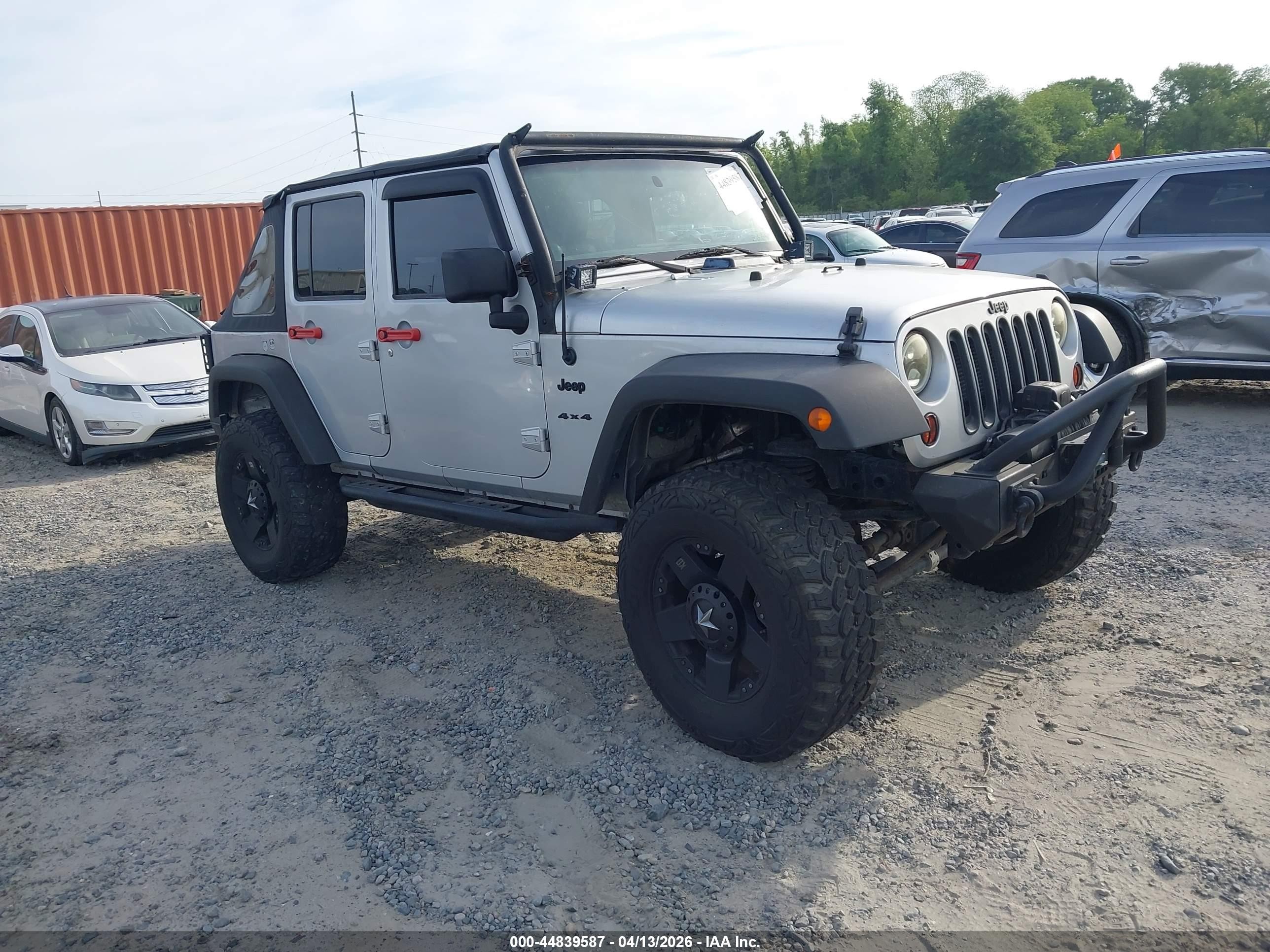 2012 Jeep Wrangler Unlimited Sport Silver vin: 1C4BJWDG7CL284519