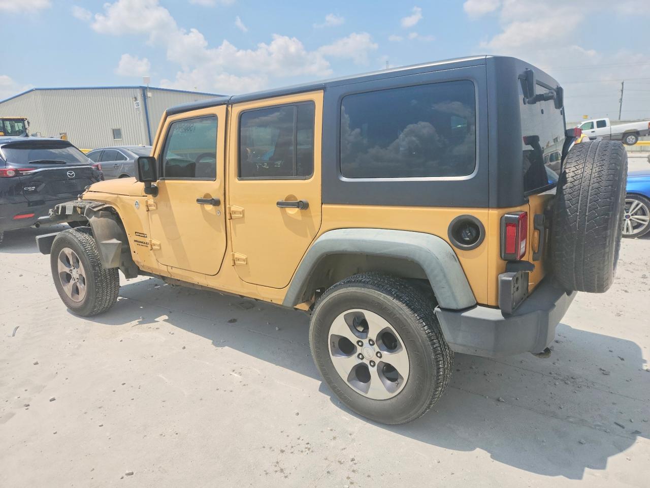 2013 Jeep Wrangler Unlimited Sport Tan vin: 1C4BJWDG7DL666826