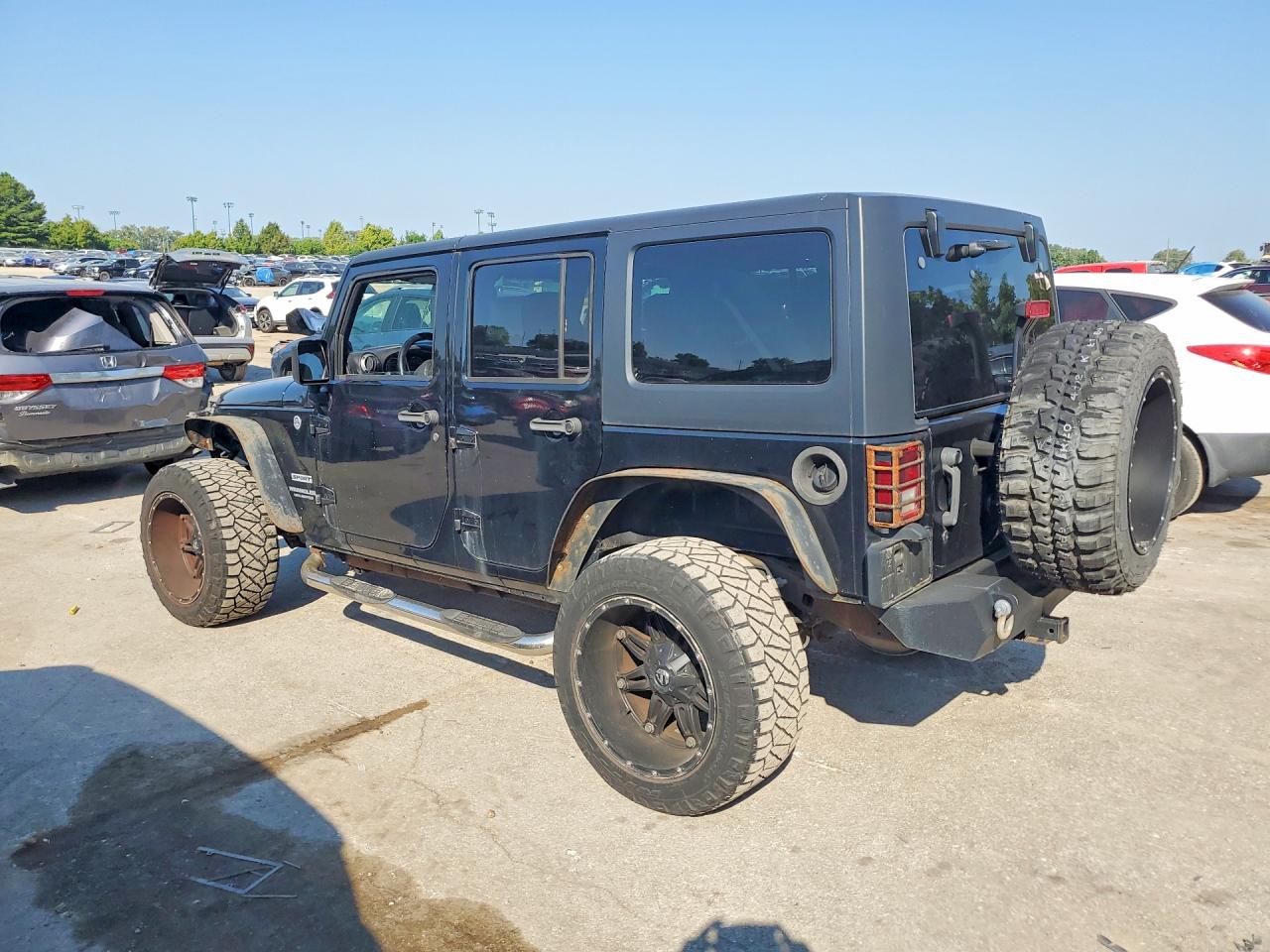 2014 Jeep Wrangler Unlimited Sport Black vin: 1C4BJWDG7EL207443