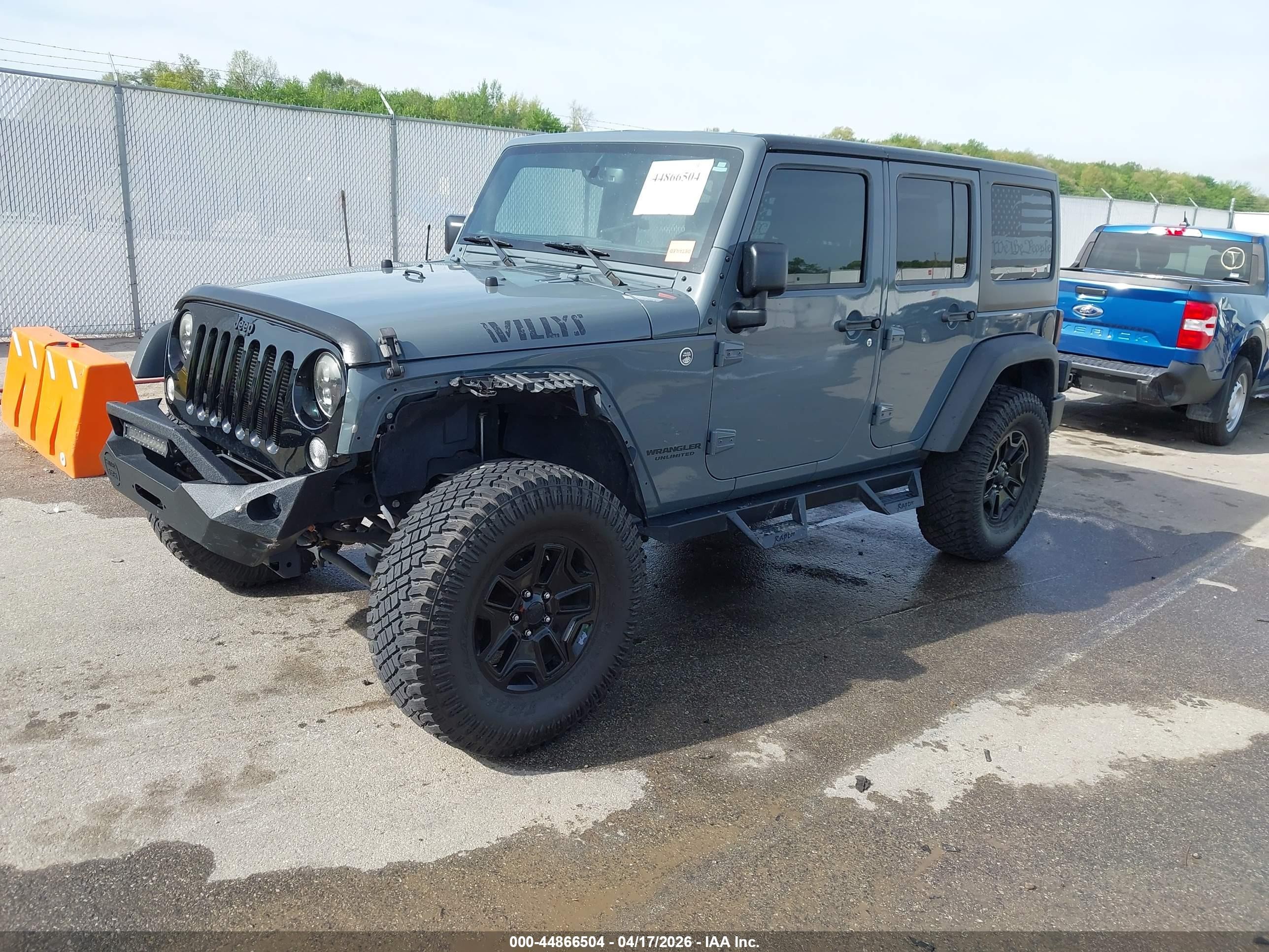 2015 Jeep Wrangler Unlimited Willys Wheeler Gray vin: 1C4BJWDG7FL634929