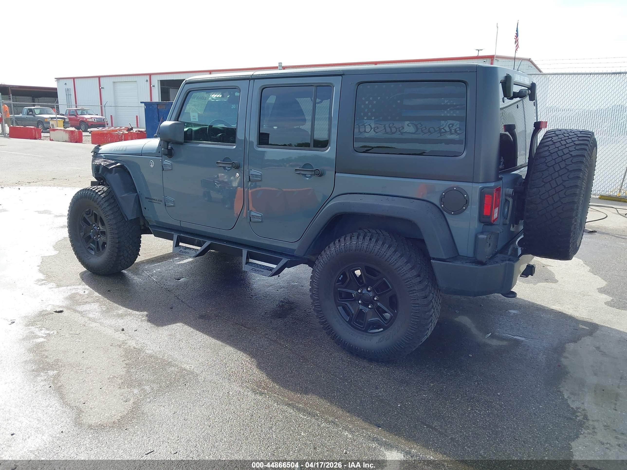 2015 Jeep Wrangler Unlimited Willys Wheeler Gray vin: 1C4BJWDG7FL634929