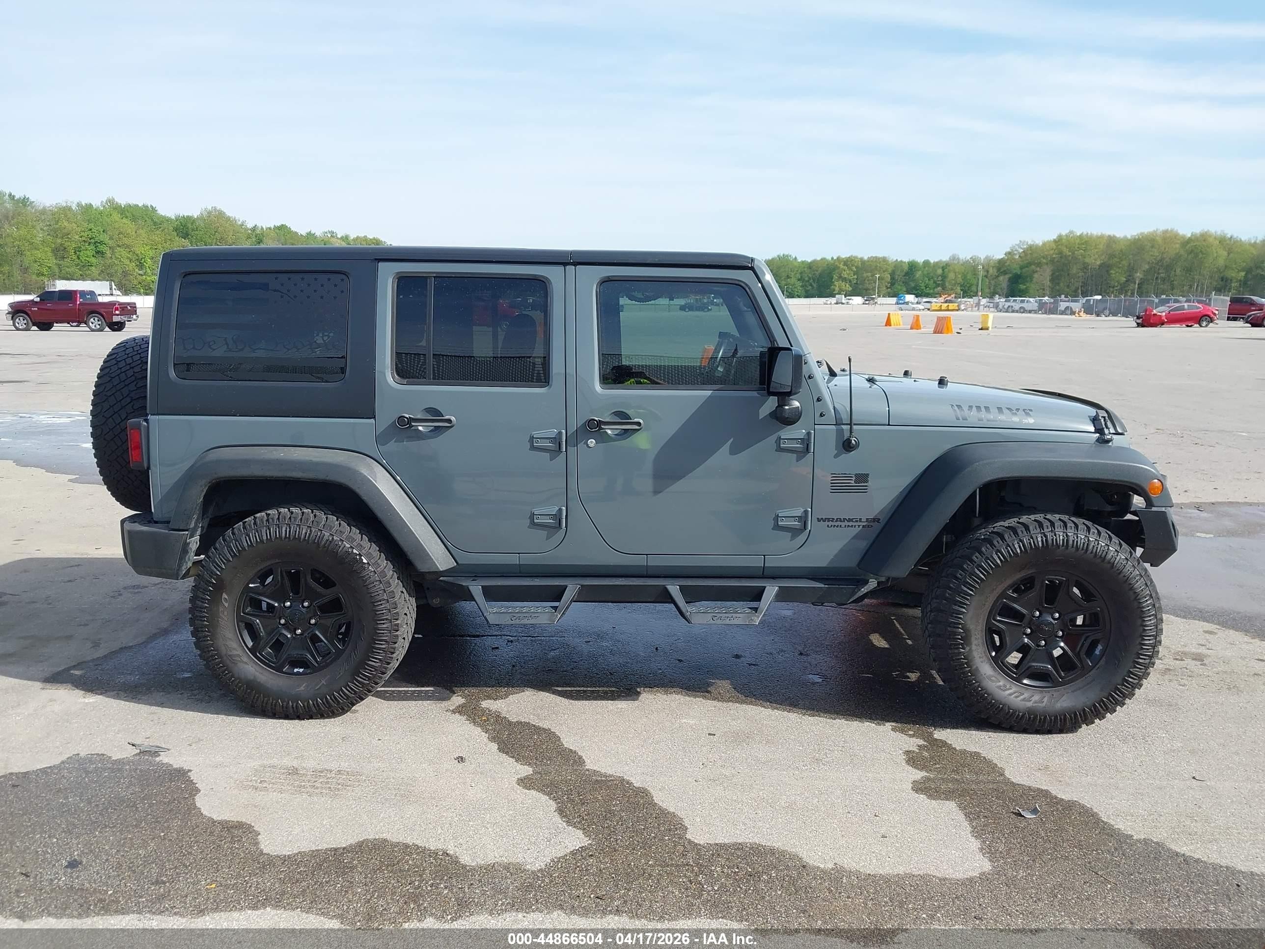2015 Jeep Wrangler Unlimited Willys Wheeler Gray vin: 1C4BJWDG7FL634929