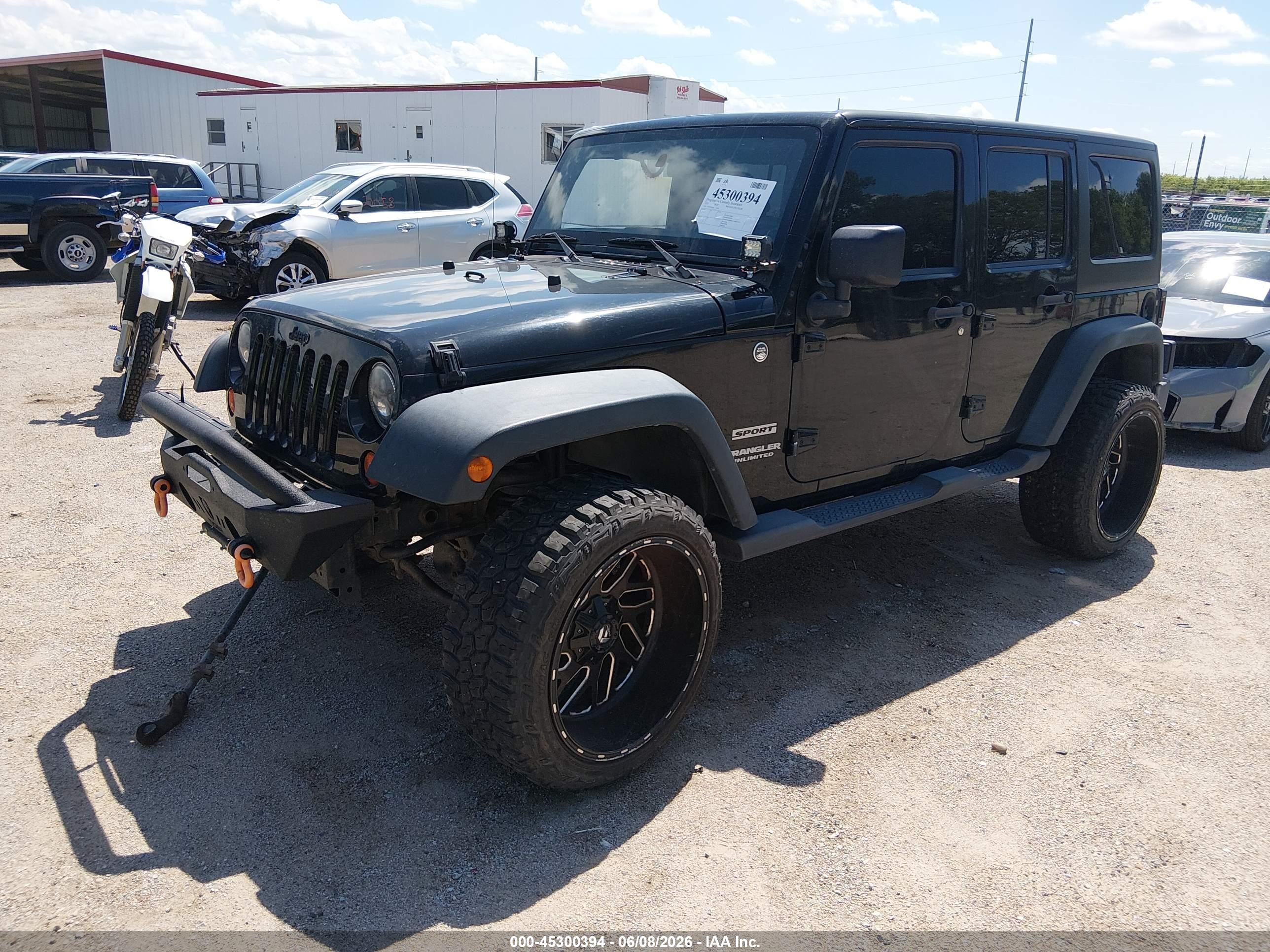 2012 Jeep Wrangler Unlimited Sport Black vin: 1C4BJWDG8CL200899