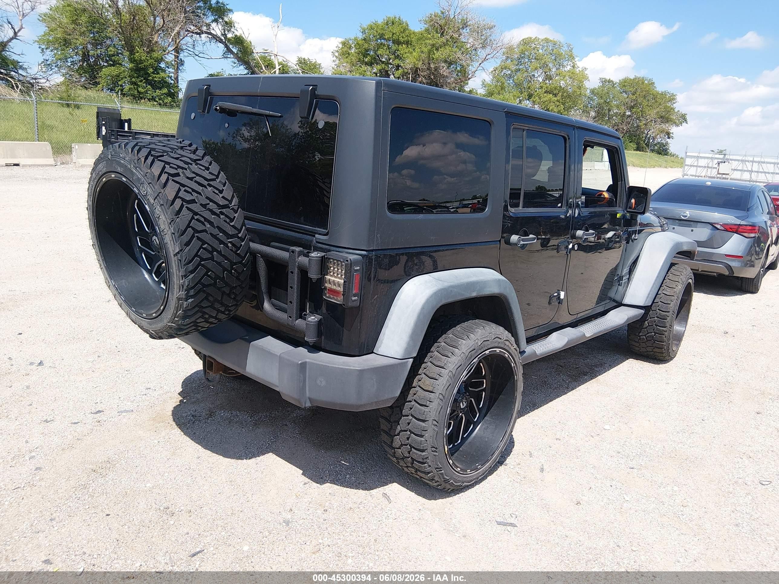 2012 Jeep Wrangler Unlimited Sport Black vin: 1C4BJWDG8CL200899