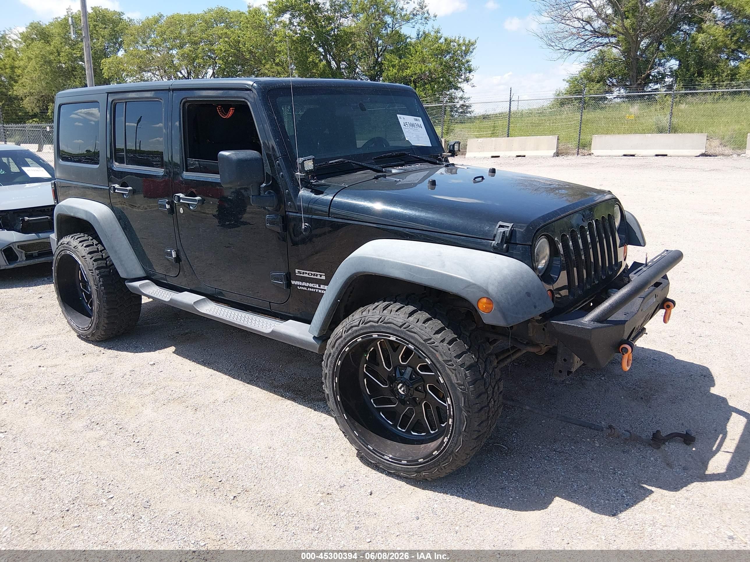 2012 Jeep Wrangler Unlimited Sport Black vin: 1C4BJWDG8CL200899