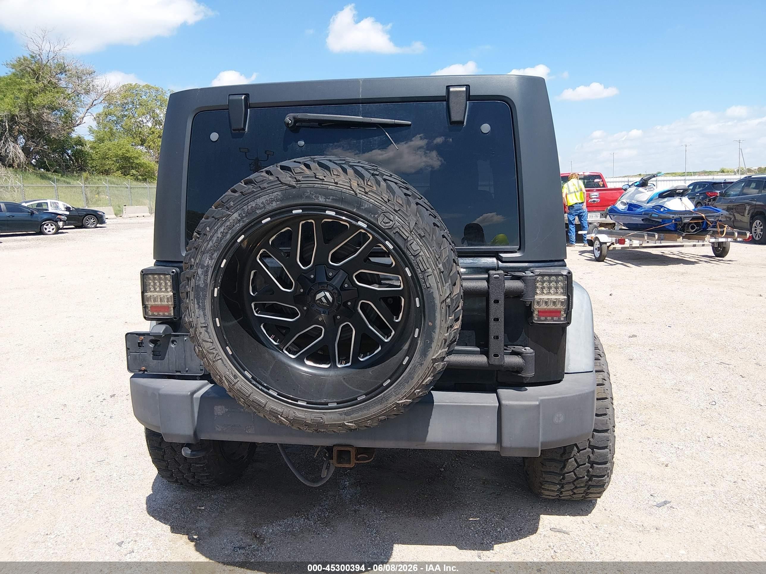 2012 Jeep Wrangler Unlimited Sport Black vin: 1C4BJWDG8CL200899