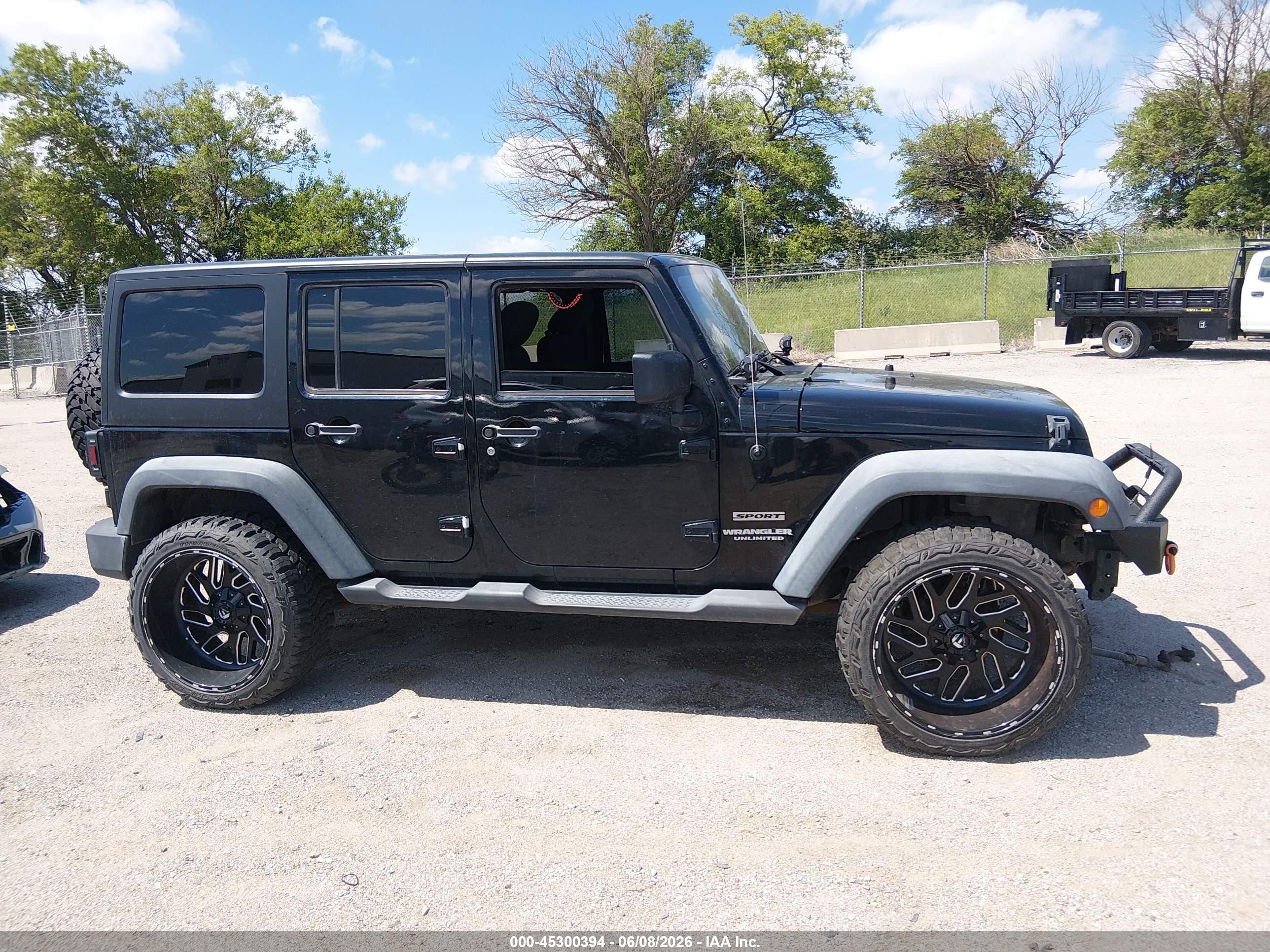 2012 Jeep Wrangler Unlimited Sport Black vin: 1C4BJWDG8CL200899