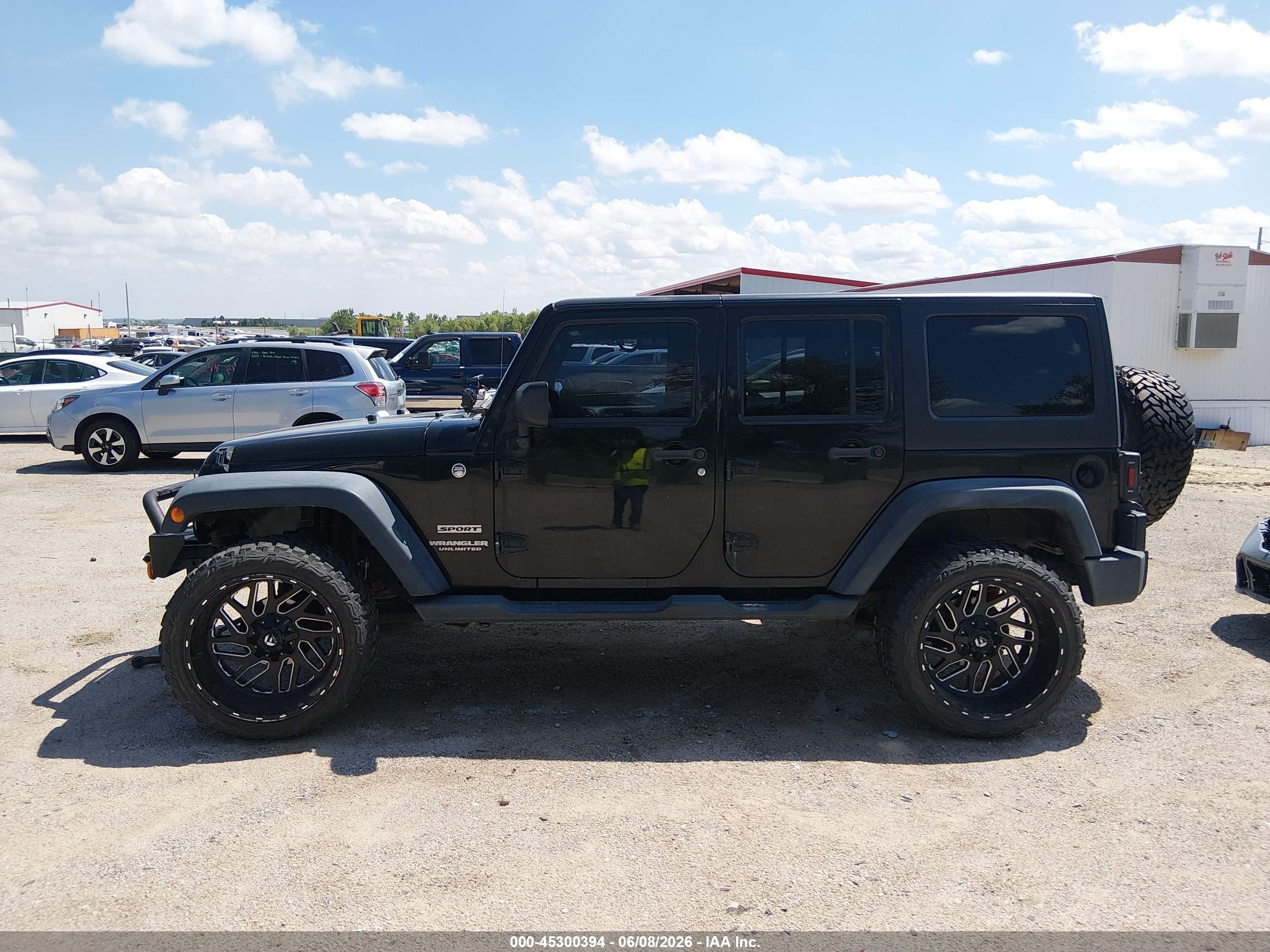 2012 Jeep Wrangler Unlimited Sport Black vin: 1C4BJWDG8CL200899