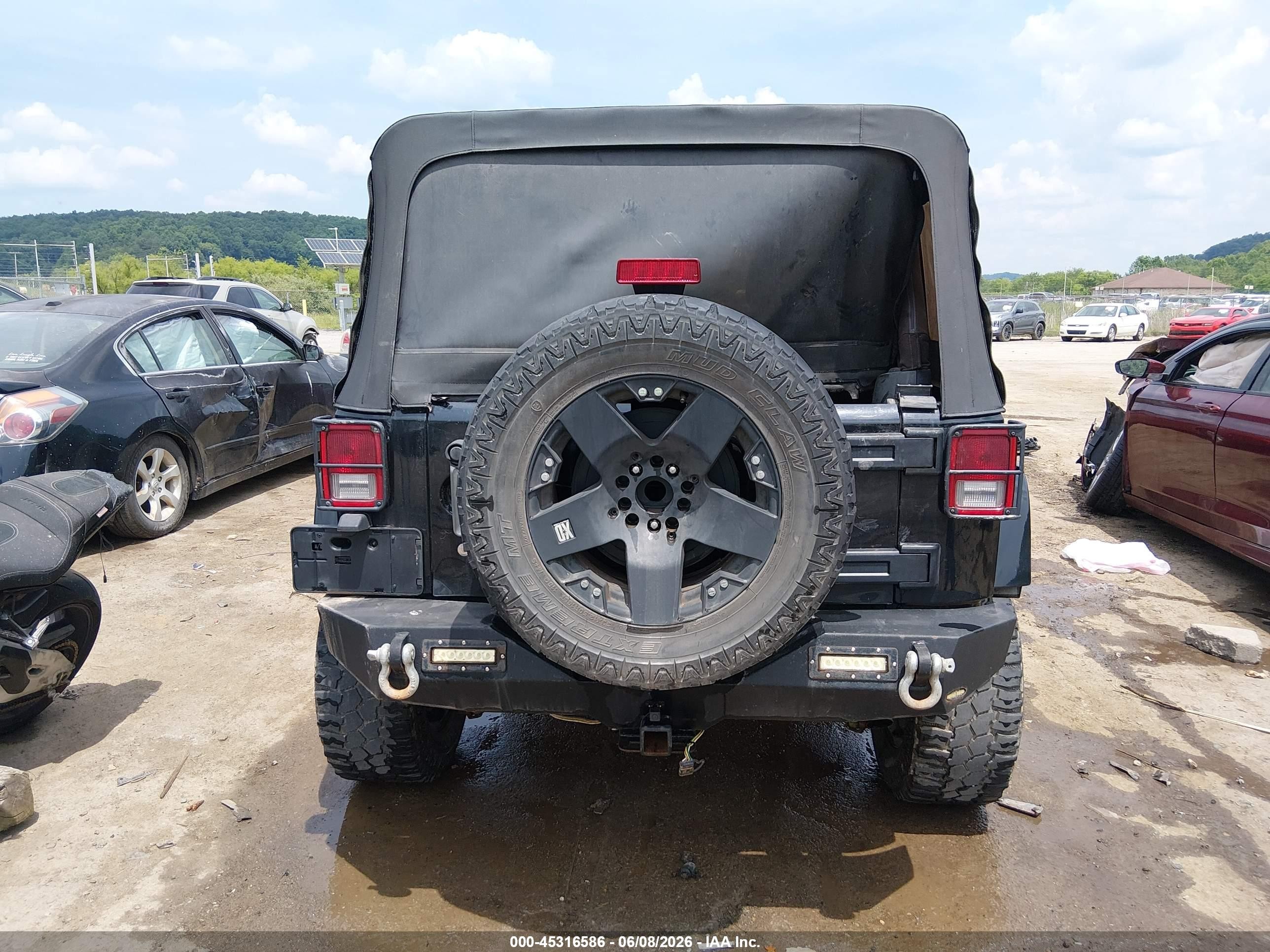2012 Jeep Wrangler Unlimited Sport Черный vin: 1C4BJWDG8CL208470
