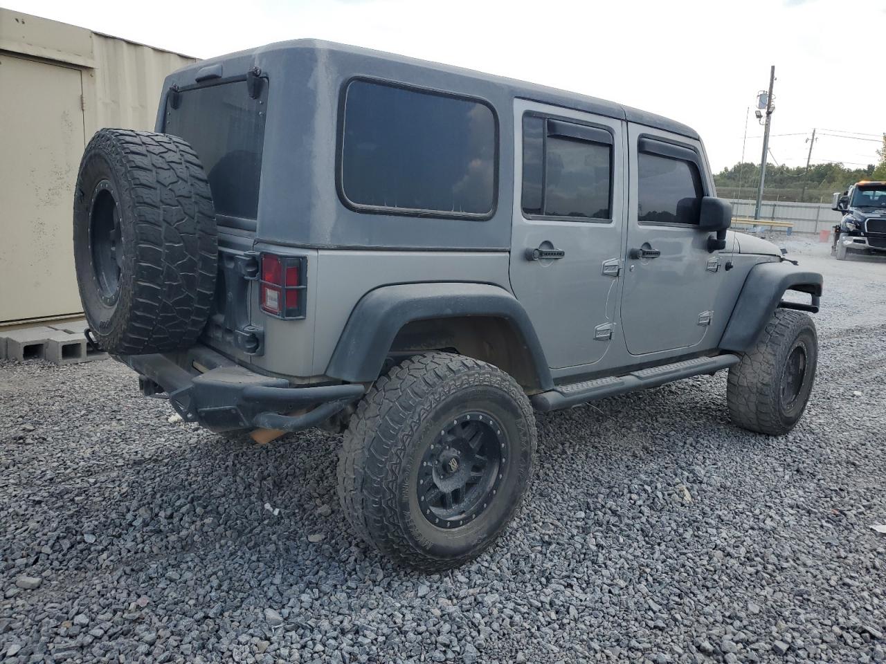 2013 Jeep Wrangler Unlimited Sport Silver vin: 1C4BJWDG8DL548722 Damage: Right Rear Door, Heavy Scratch, 1 to 2 inches