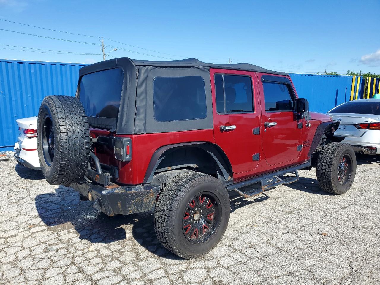 2013 Jeep Wrangler Unlimited Sport Burgundy vin: 1C4BJWDG8DL577508