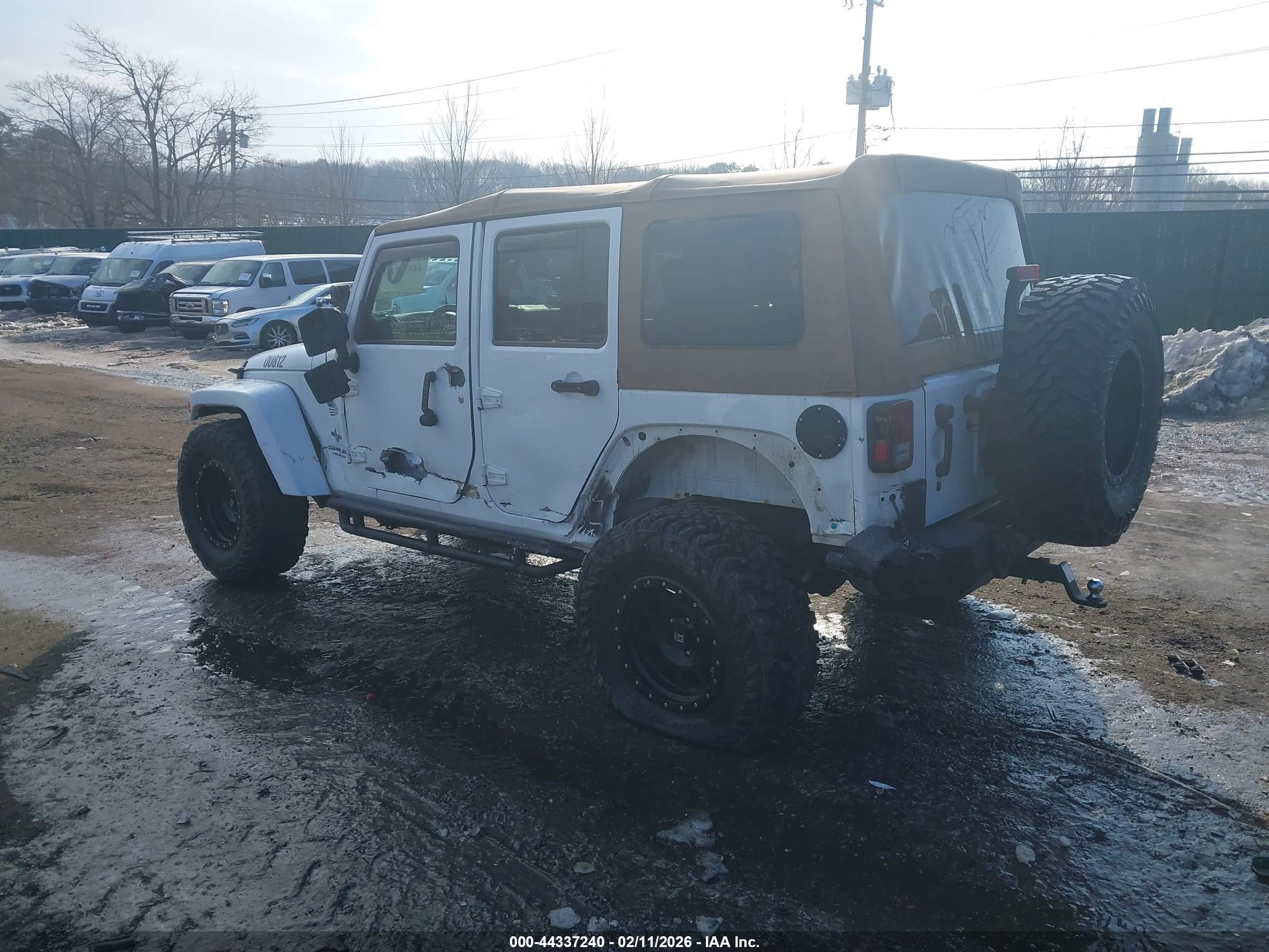 2015 Jeep Wrangler Unlimited Freedom Edition White vin: 1C4BJWDG8FL573347