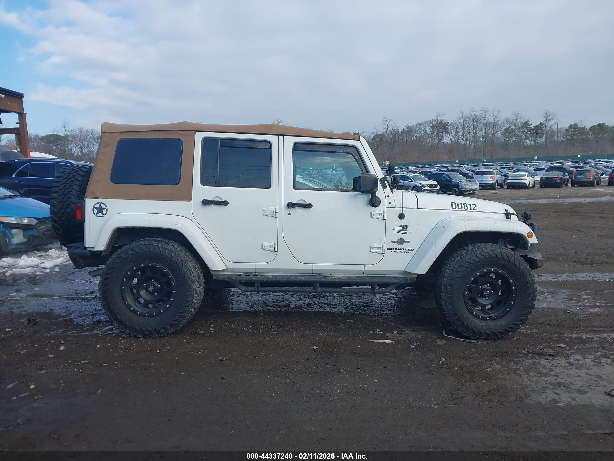 2015 Jeep Wrangler Unlimited Freedom Edition White vin: 1C4BJWDG8FL573347
