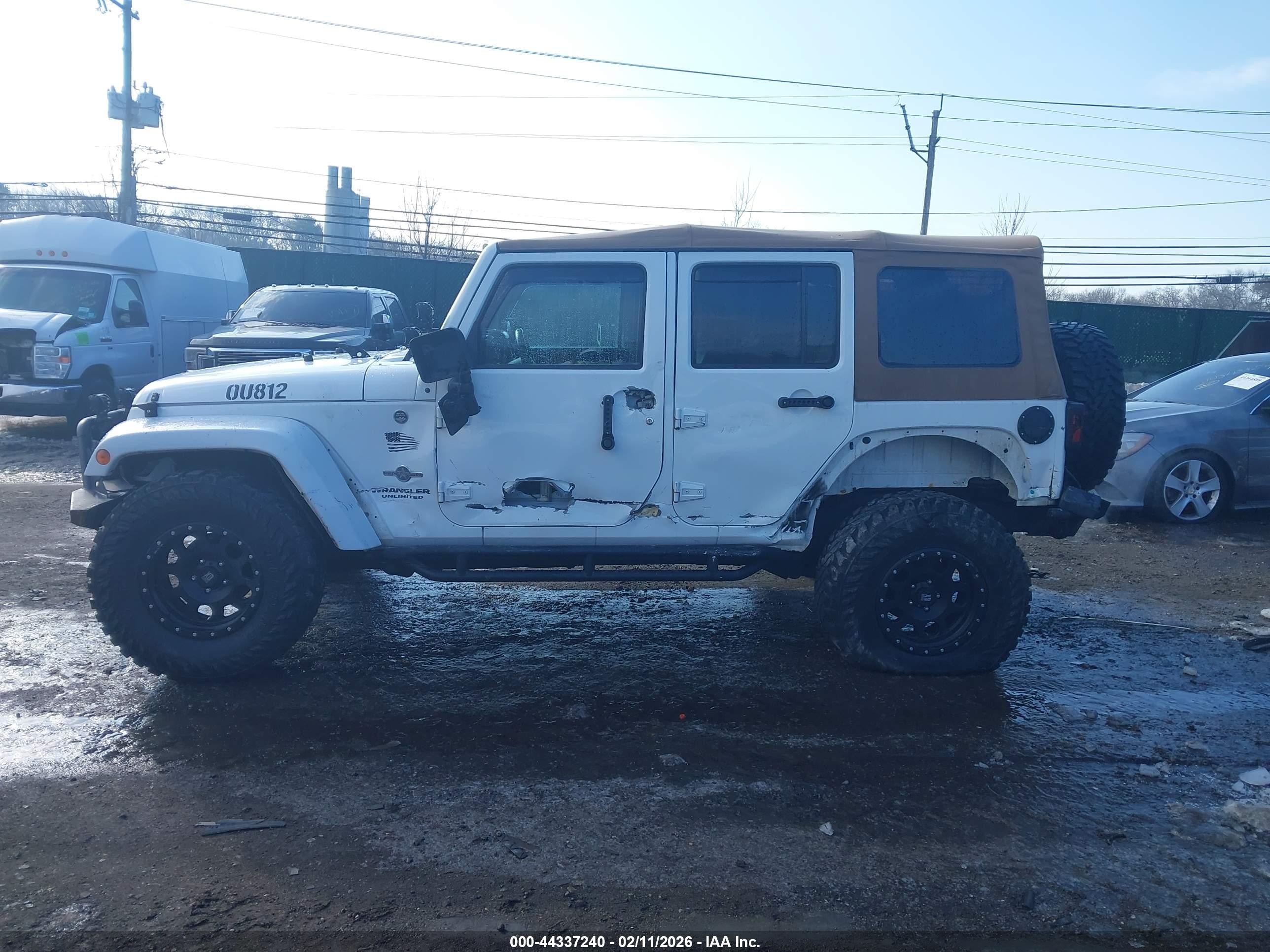 2015 Jeep Wrangler Unlimited Freedom Edition White vin: 1C4BJWDG8FL573347
