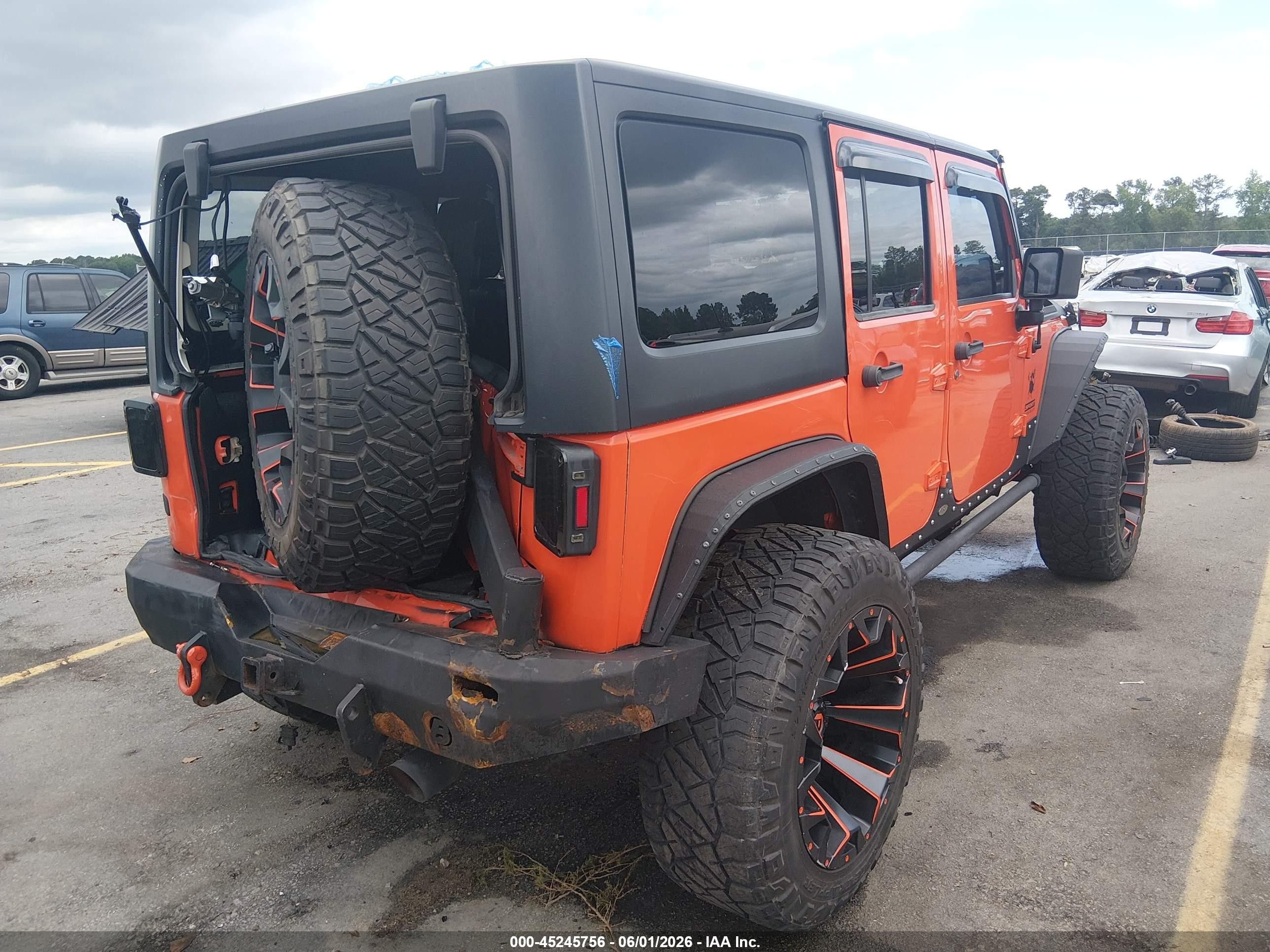 2015 Jeep Wrangler Unlimited Sport Orange vin: 1C4BJWDG8FL577625