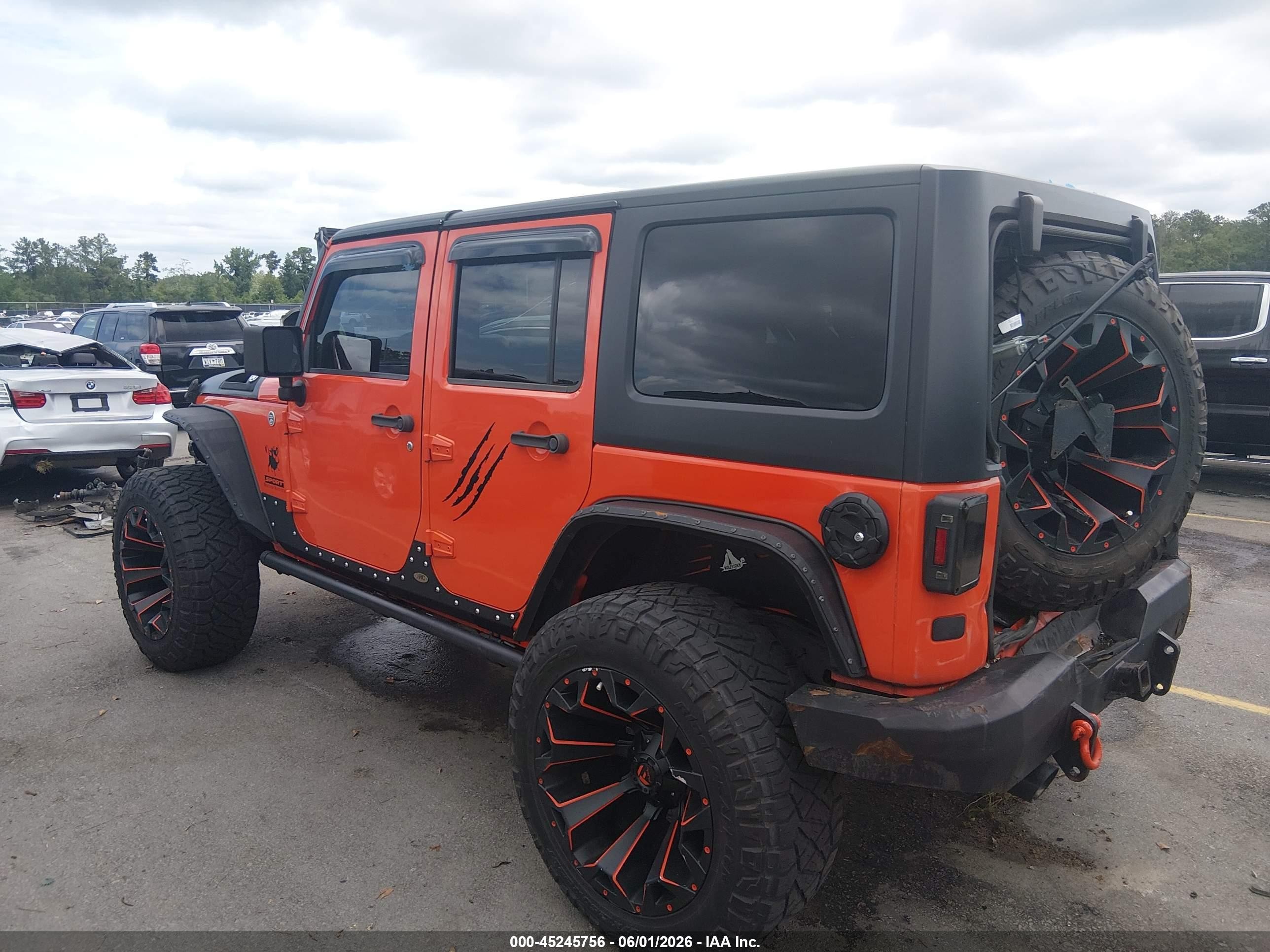 2015 Jeep Wrangler Unlimited Sport Orange vin: 1C4BJWDG8FL577625