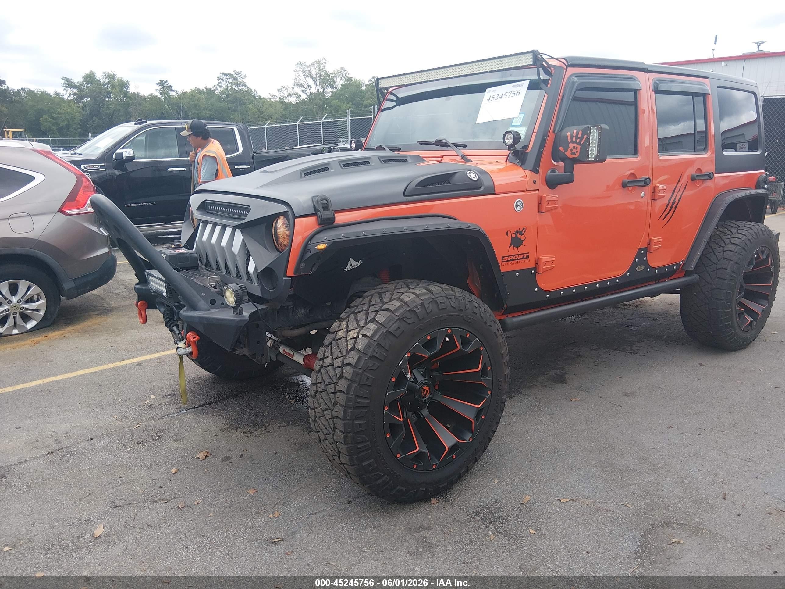 2015 Jeep Wrangler Unlimited Sport Orange vin: 1C4BJWDG8FL577625