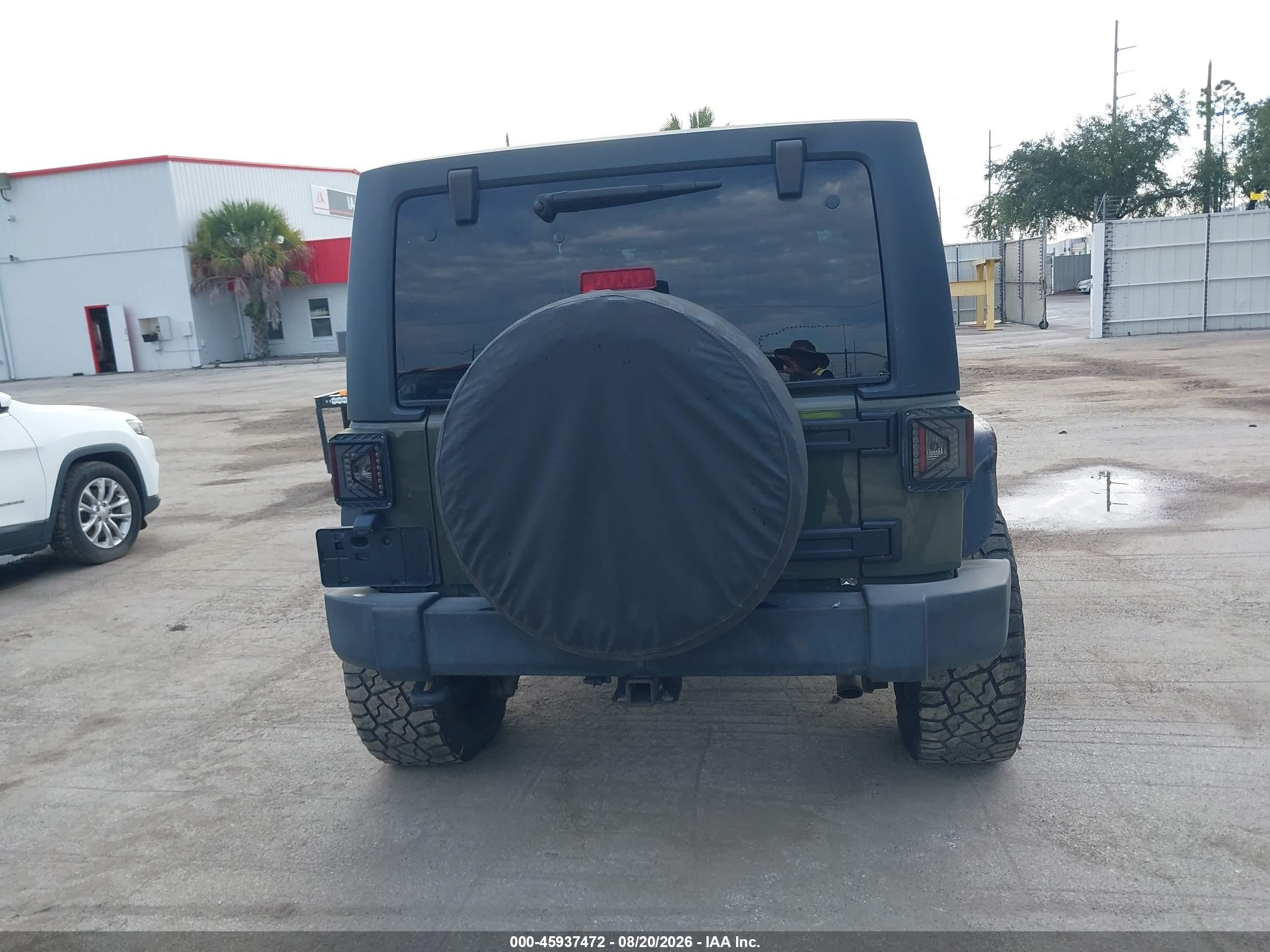 2015 Jeep Wrangler Unlimited Sport Green vin: 1C4BJWDG8FL720900