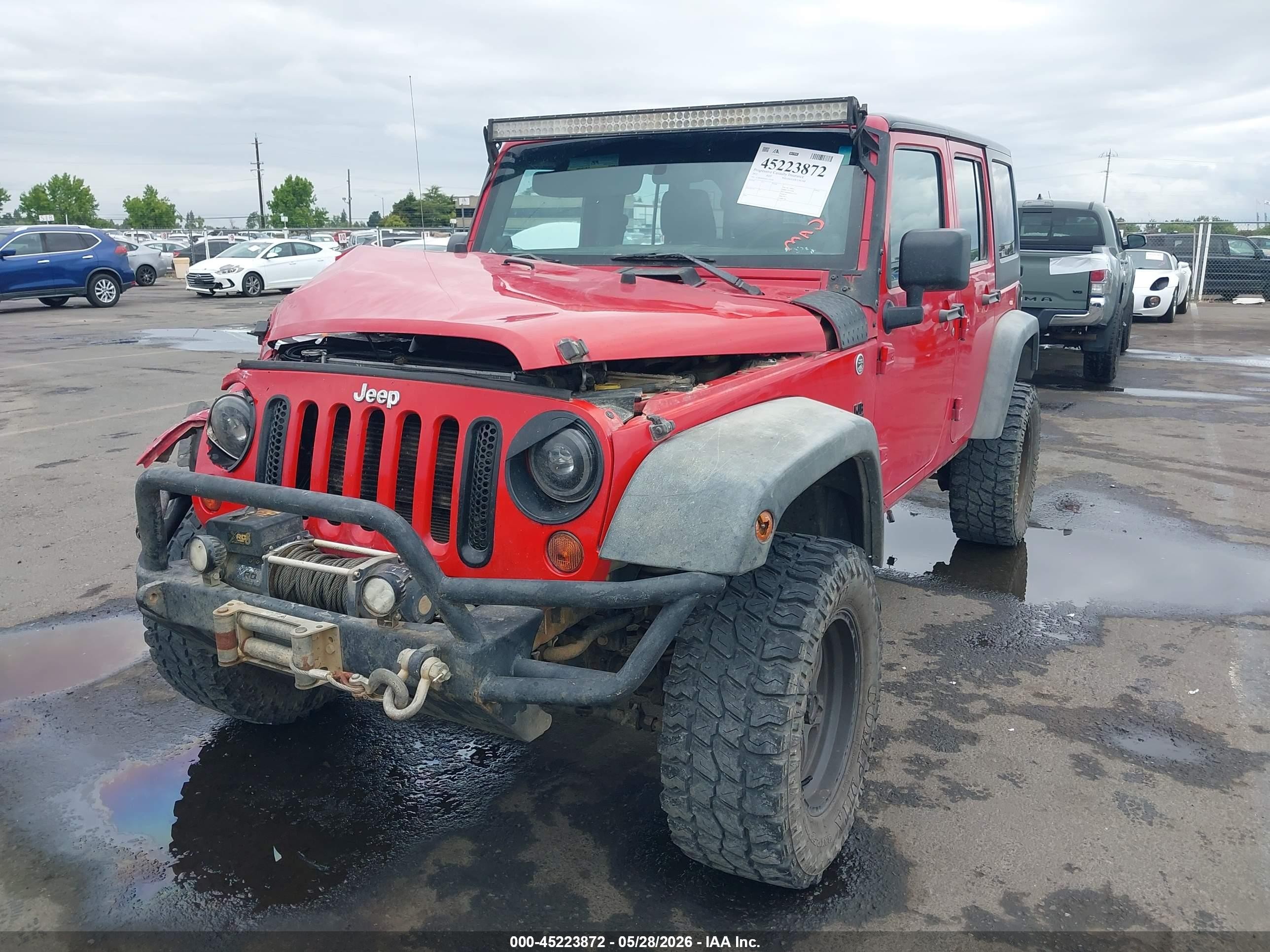 2012 Jeep Wrangler Unlimited Sport Red vin: 1C4BJWDG9CL133228