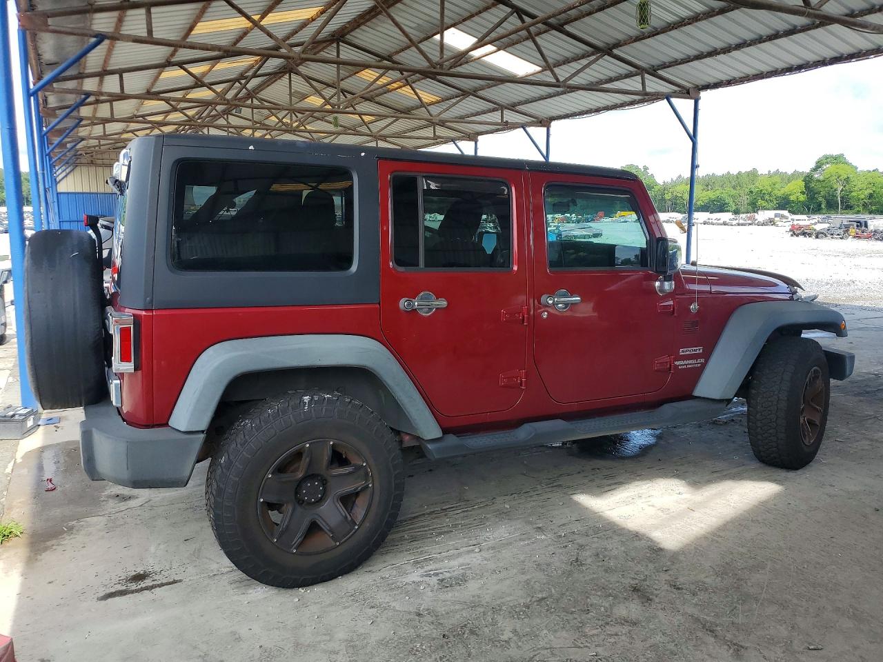 2012 Jeep Wrangler Unlimited Sport Burgundy vin: 1C4BJWDG9CL184177