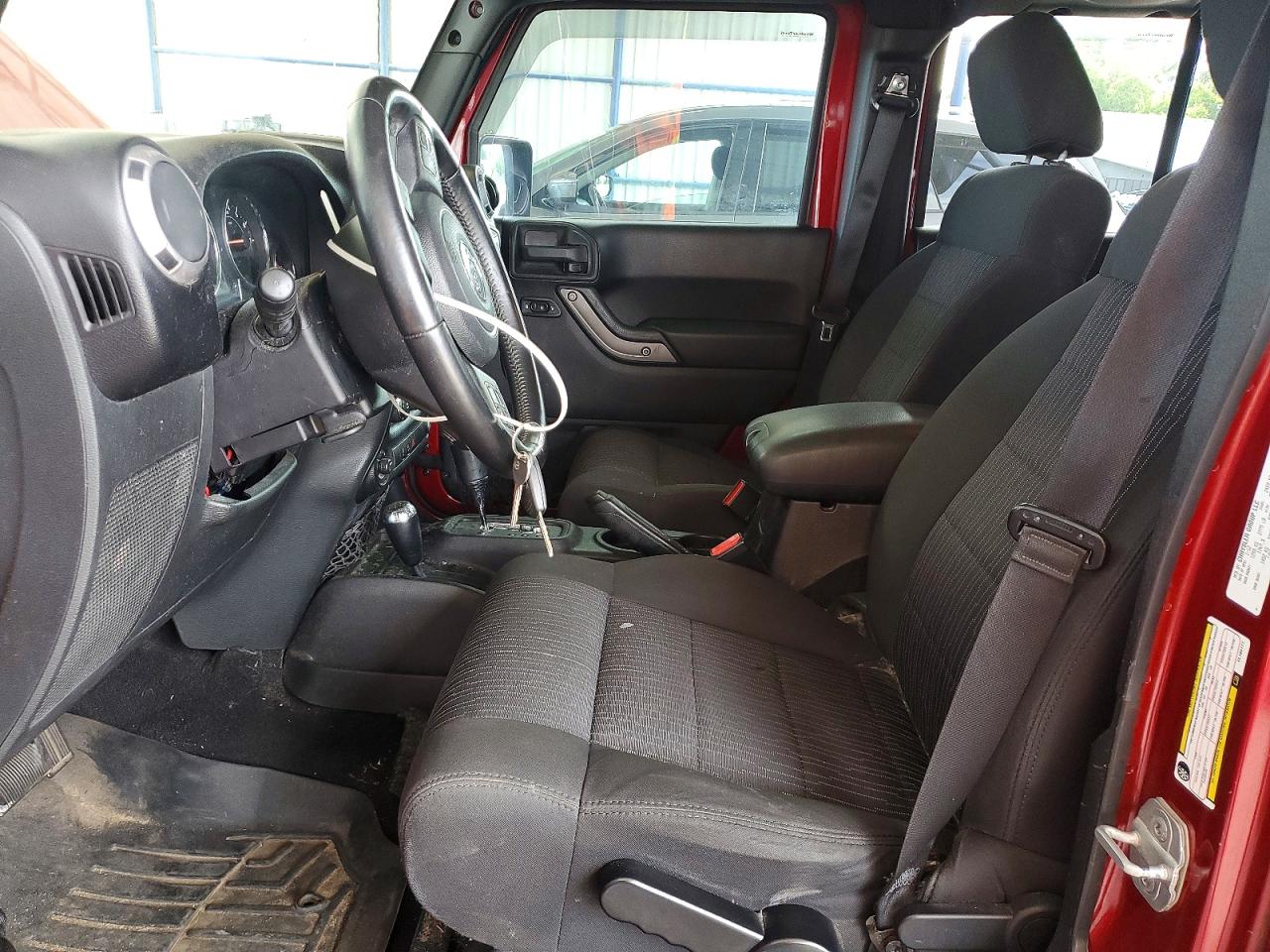 2012 Jeep Wrangler Unlimited Sport Burgundy vin: 1C4BJWDG9CL184177