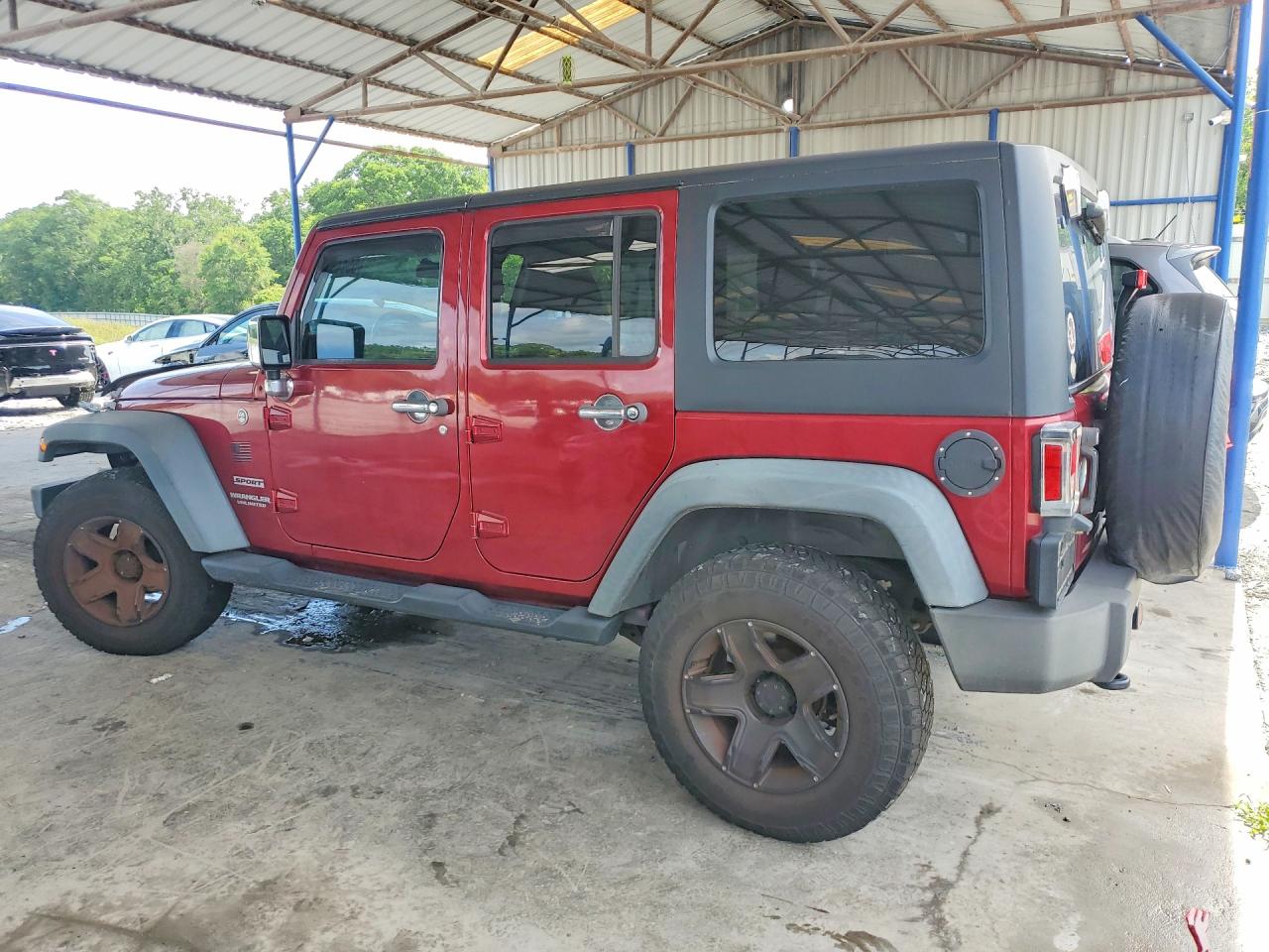 2012 Jeep Wrangler Unlimited Sport Burgundy vin: 1C4BJWDG9CL184177